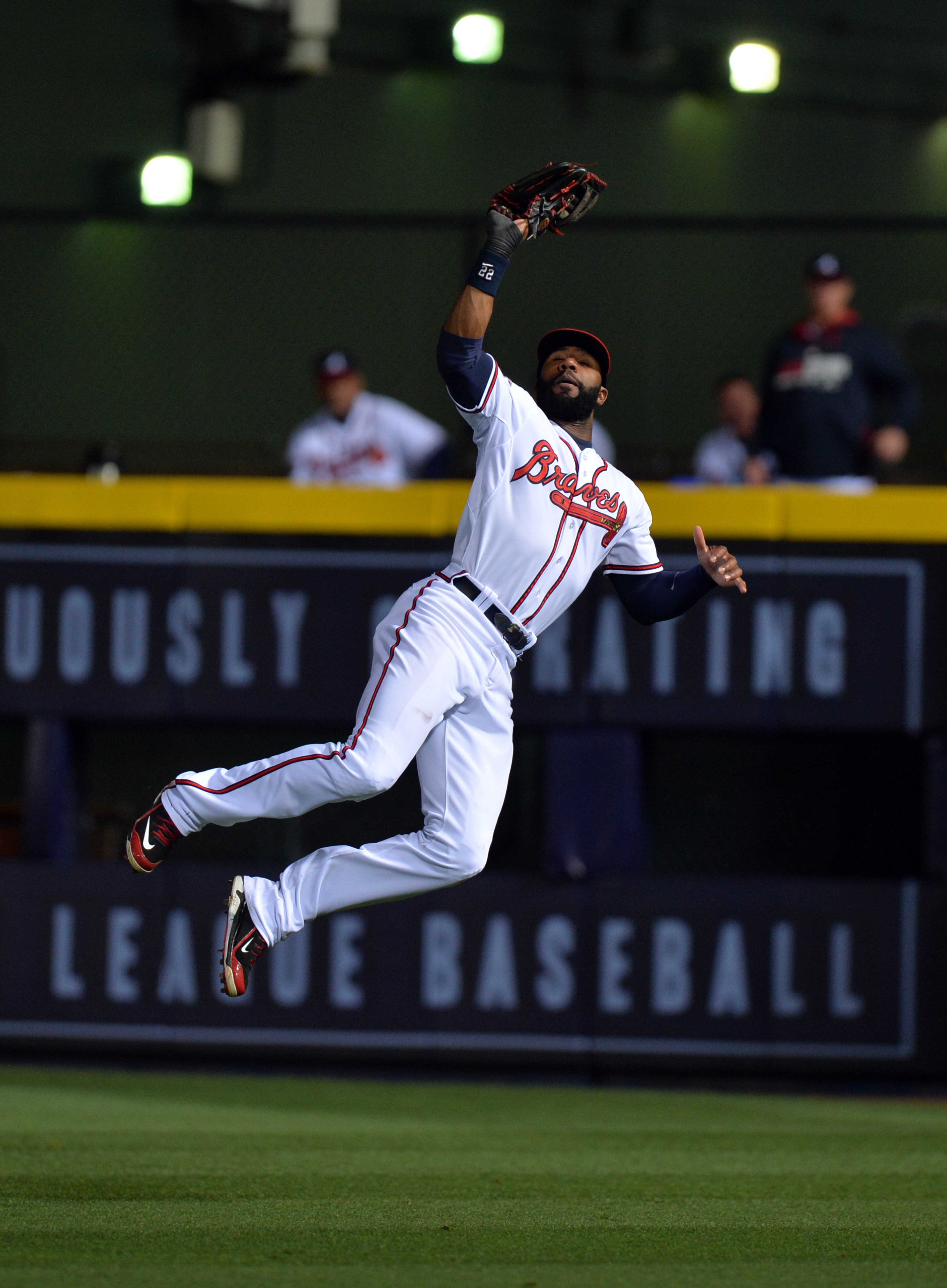 Atlanta Braves right fielder Jason Heyward makes a leaping catch in the 6th inning off the bat of Chicago Cubs John Baker at Turner Field Friday May 9, 2014. BRANT SANDERLIN /BSANDERLIN@AJC.COM