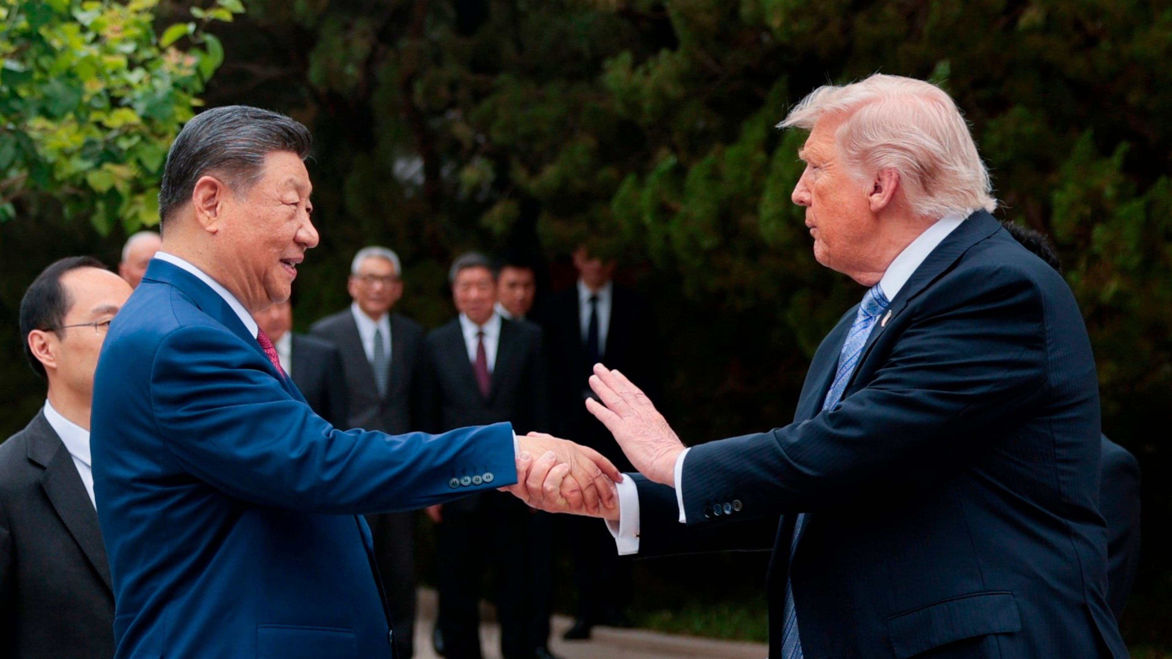 FILE - U.S. President Donald Trump, right, shakes hands with Chinese President Xi Jinping while leaving after a visit to the Zhongnanhai Garden in Beijing, Friday, May 15, 2026. (Evan Vucci/Pool Photo via AP, File)