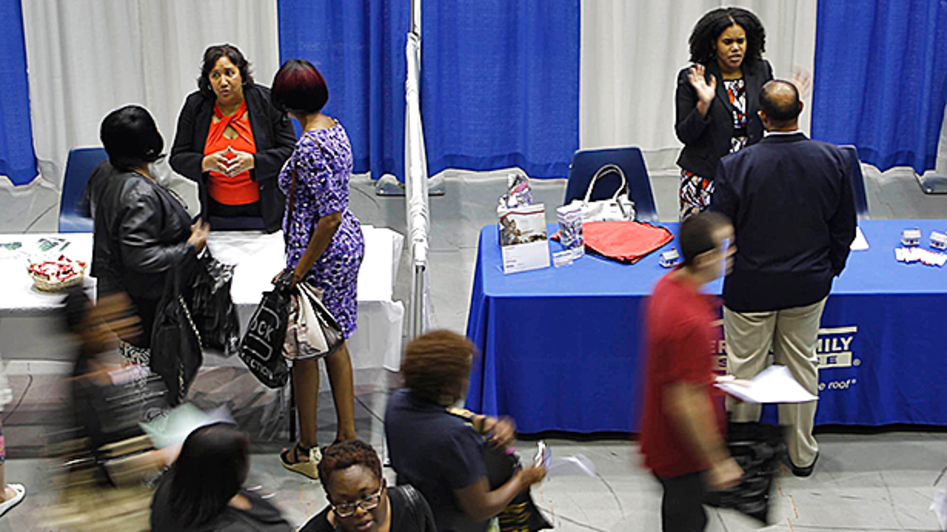 September 18, 2014 - Marietta - More than 80 employers had booths at today's CobbWorks job fair at the Cobb County Civic Center in Marietta. Georgia’s unemployment rate jumped to 8.1 percent in August from a revised 7.7 percent in July — even as the number of jobs increased and layoffs declined, the state labor department said Thursday. BOB ANDRES / BANDRES@AJC.COM
