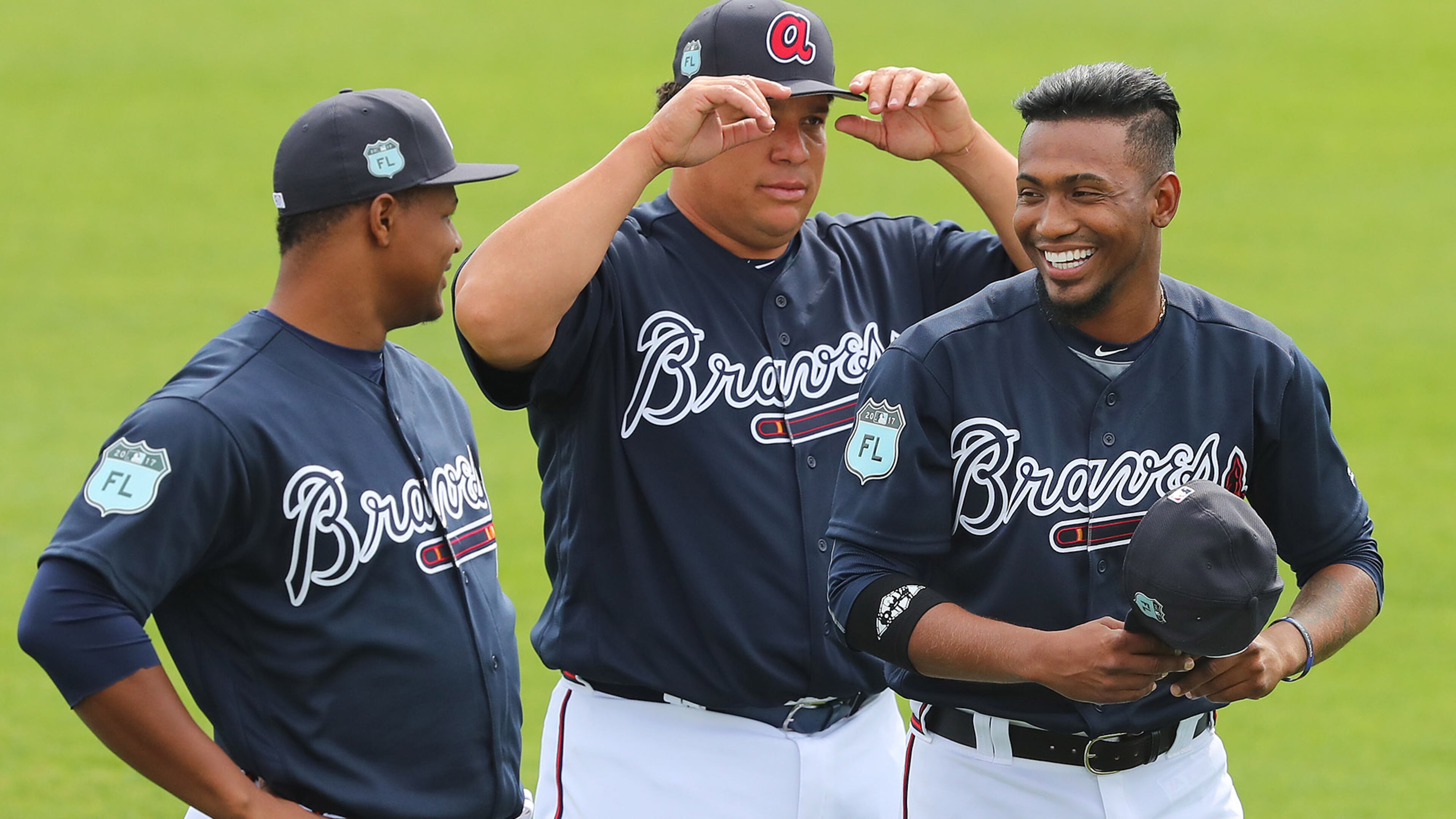 February 15, 2017, Lake Buena Vista, FL: Braves pitchers Mauricio Cabrera (from left), Bartolo Colon, and Julio Teheran share a laugh during their first spring training workout on Wednesday Feb. 15, 2017, at the ESPN Wide World of Sports in Lake Buena Vista. Curtis Compton/ccompton@ajc.com