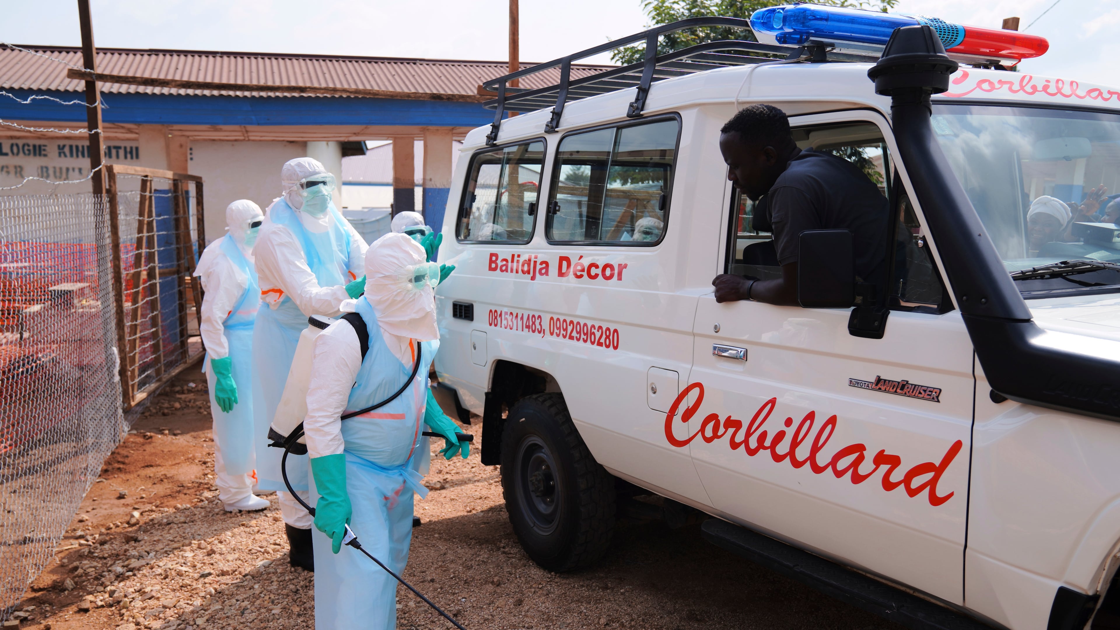 Health workers disinfects an ambulance at Ebola Treatment Center at Bunia General Hospital in Ituri, Congo, Wednesday, July 22, 2026. (AP Photo/Dirole Lotsima Dieudonne)