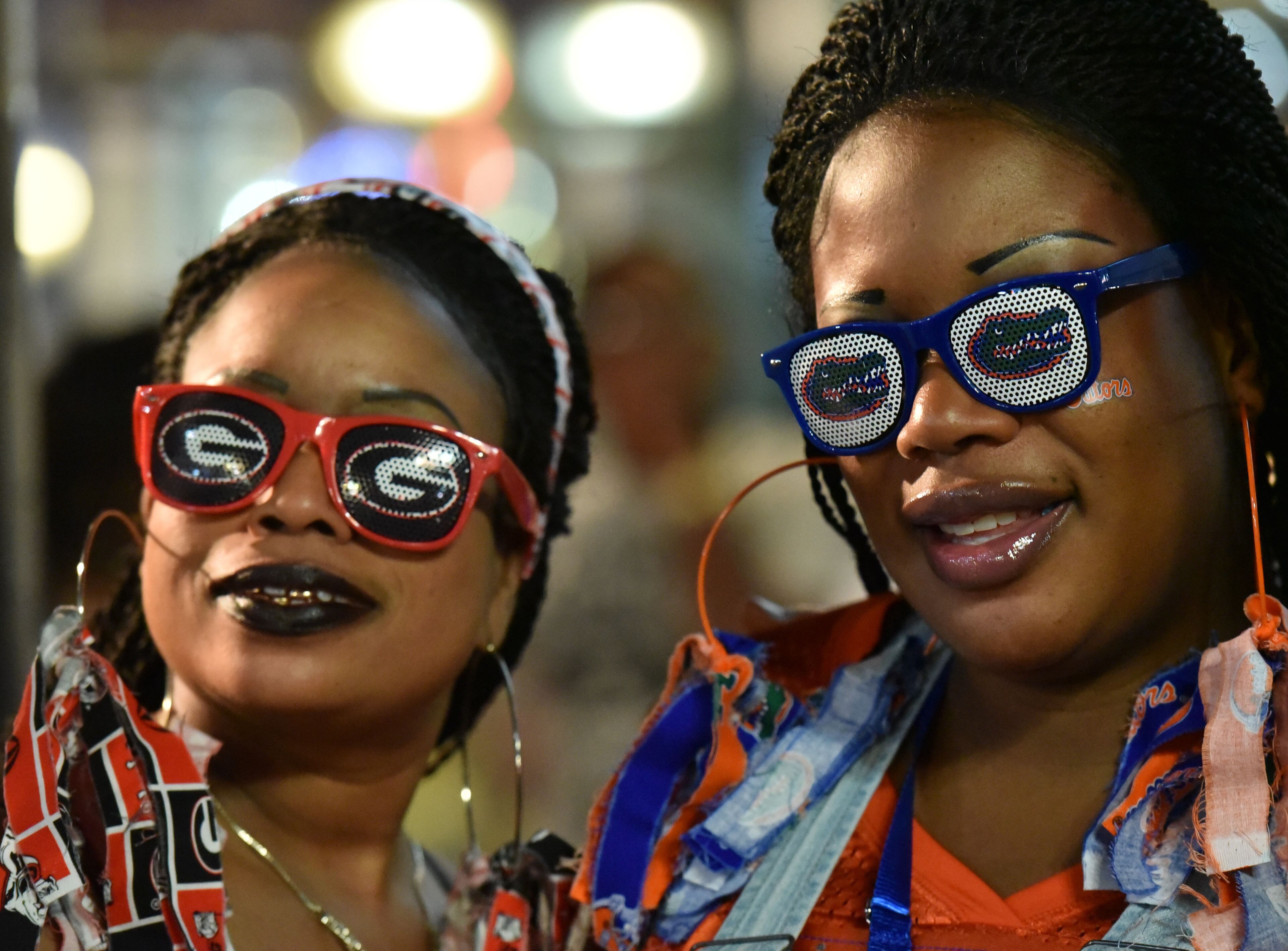 October 30, 2015 Jacksonville, Florida - Georgia and Florida fans gather to celebrate during an annual party at the Jacksonville Landing on the eve of the Georgia - Florida game on Friday, October 30, 2015. HYOSUB SHIN / HSHIN@AJC.COM