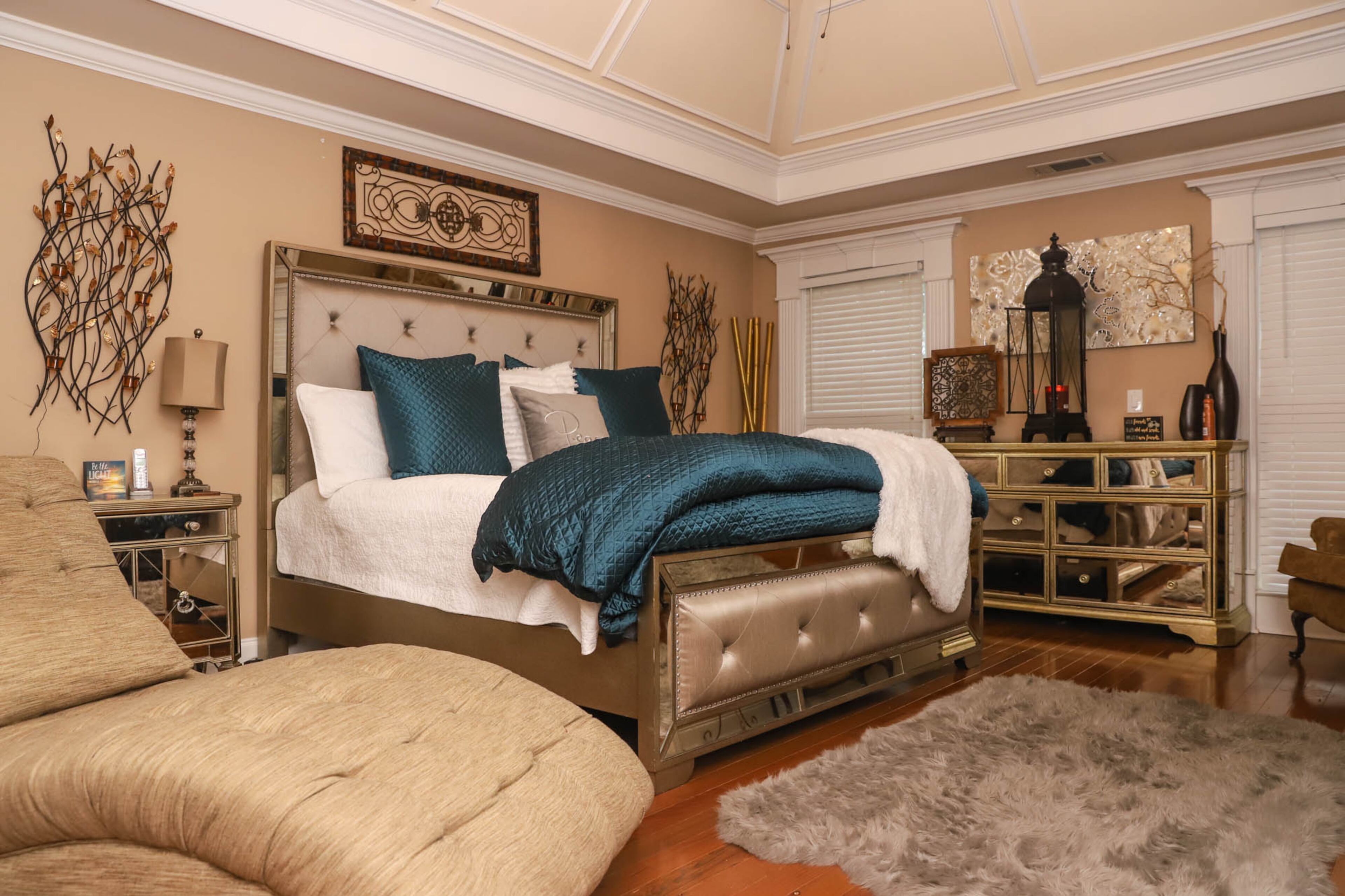 “It’s peaceful and relaxing,” said Nadine Faison of her master bedroom, which has furniture and bedding from Z Gallerie that give it an opulent atmosphere. This space is where Faison spends most of her down time, so it acts as a retreat from work and stress. Text by Shannon Dominy. Photo by Reynolds Rogers.