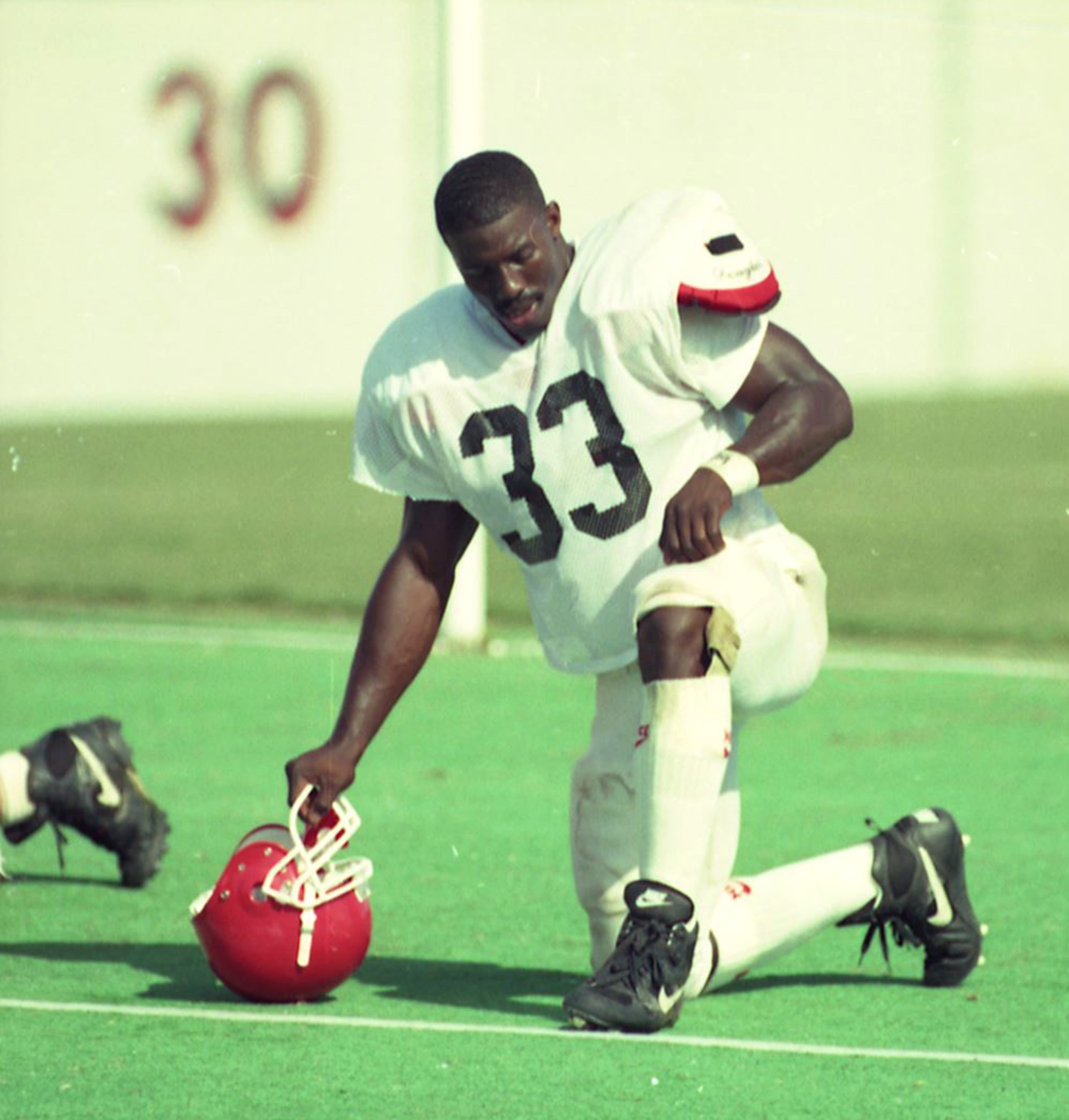 Terrell Davis rests during practice in 1994. Frank Niemeir / AJC