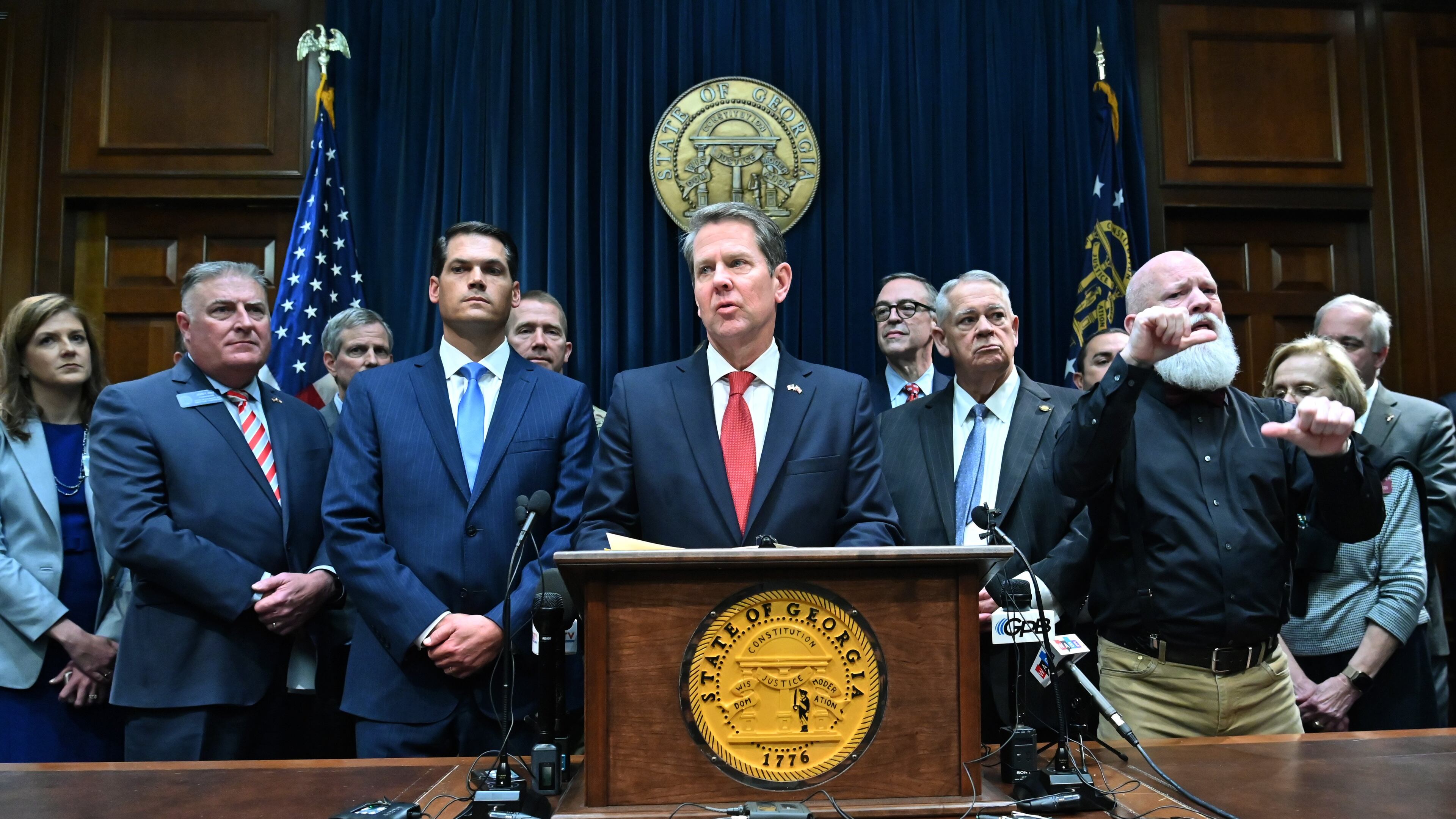 March12, 2020 Atlanta - Gov. Brian Kemp speaks as other officials standing behind during a press conference to provide an update on the state's efforts regarding COVID-19, after reporting the first death in Georgia related to coronavirus, at the Georgia State Capitol on Thursday, March 11, 2020. (Hyosub Shin / Hyosub.Shin@ajc.com)