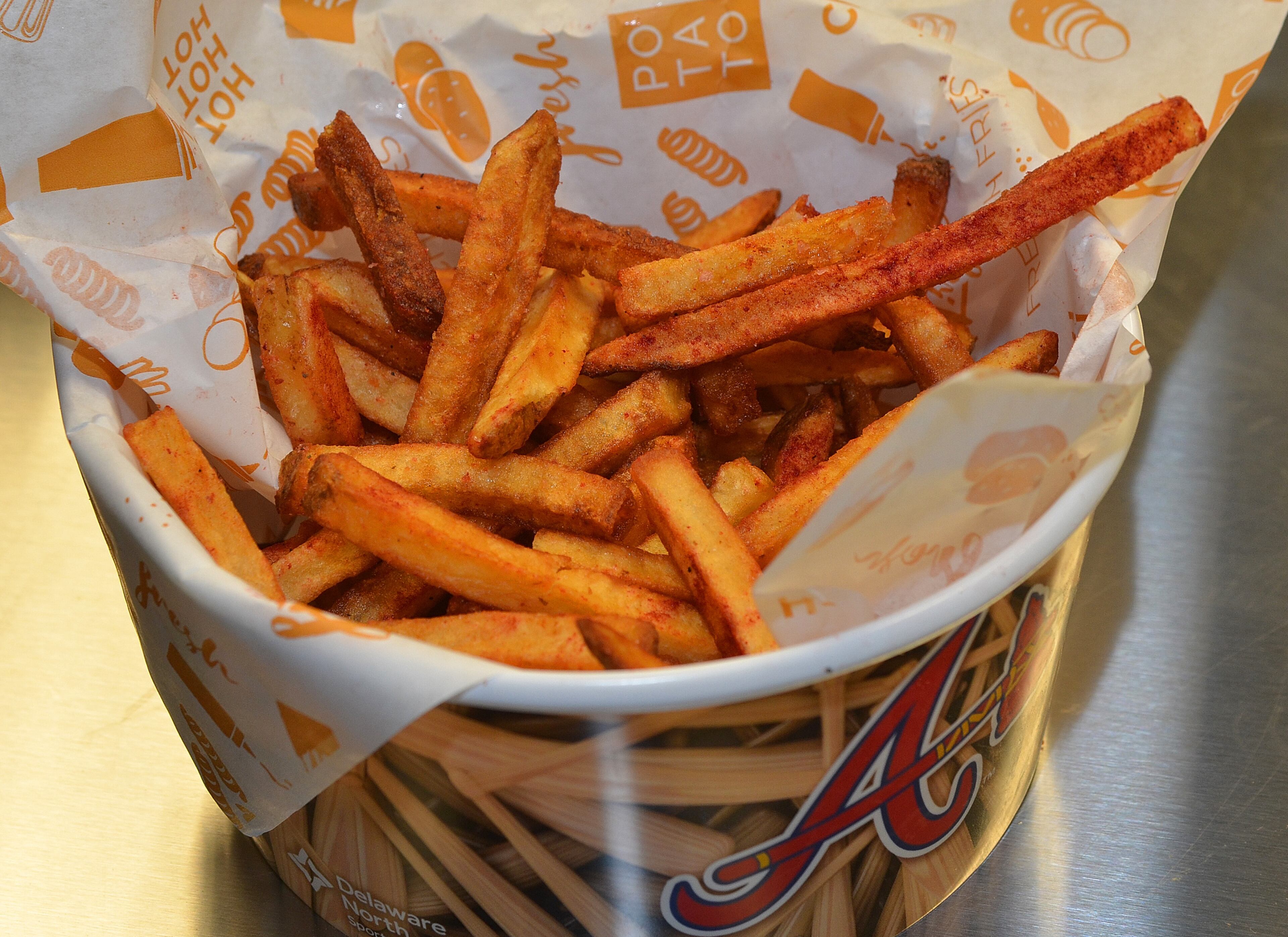 170323 Atlanta, Ga (Suntrust Park): House Made Fries will be available from The Potato Cutter at Suntrust Park for the 2017 Braves season. The Atlanta Braves and Delaware North Sportservice, the hospitality and food service provider for the Atlanta Braves, host a tasting tour of the soon to be opened Suntrust Park to reveal the food and beverage options available for the 2017 season. All photos taken Thursday March 23, 2017 at Suntrust Park 755 Battery Avenue, Smyrna, Ga 30339. (Chris Hunt/Special) for story slugged 041417Bravesdishes