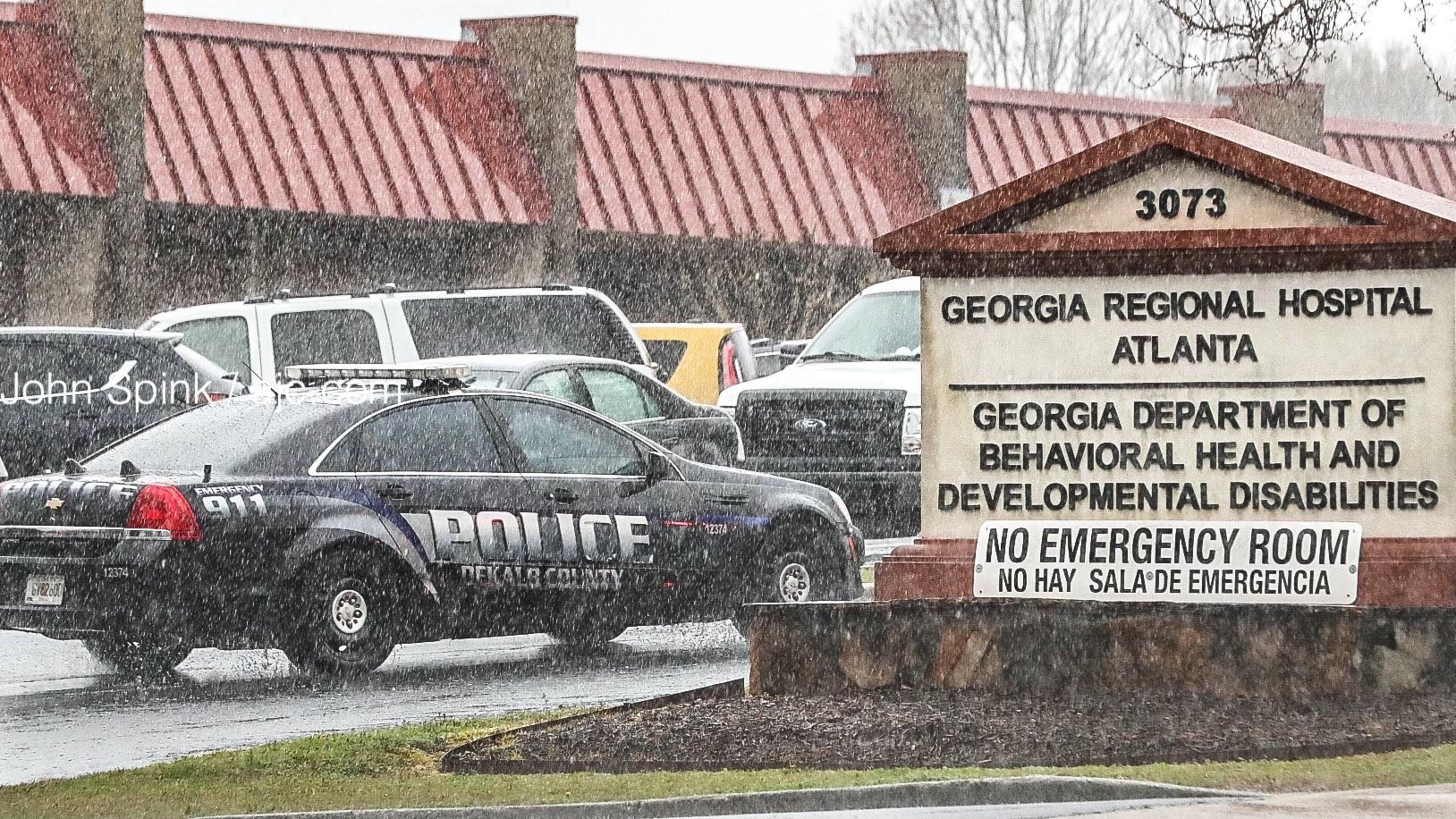 DeKalb police initially said authorities arrested two people believed to be bounty hunters. On Wednesday, an agency spokeswoman said they just detained two bail bondsmen during the on-scene investigation.