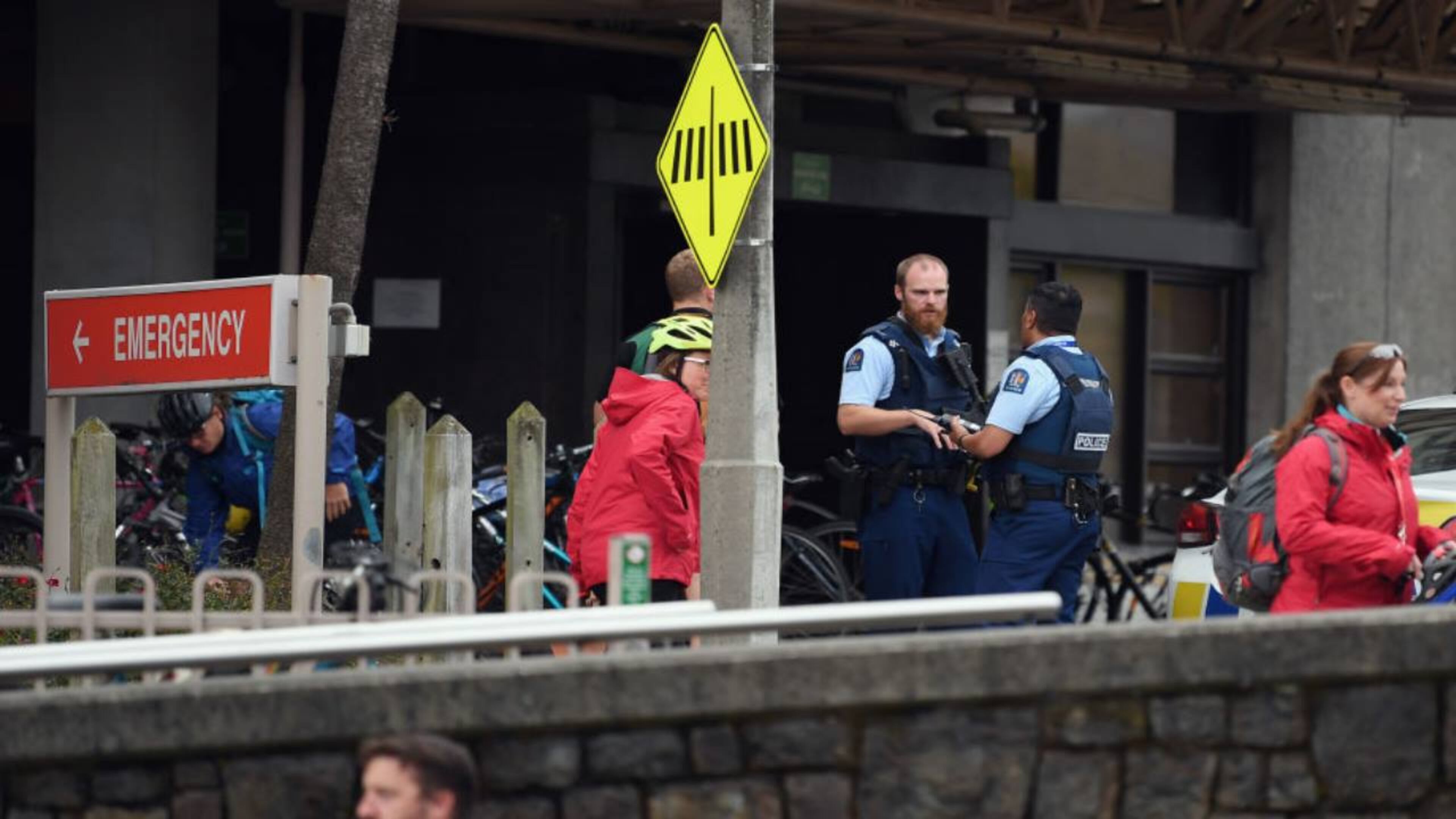 Police are seen in front of Christchurch Hospital during a lockdown Friday in New Zealand.