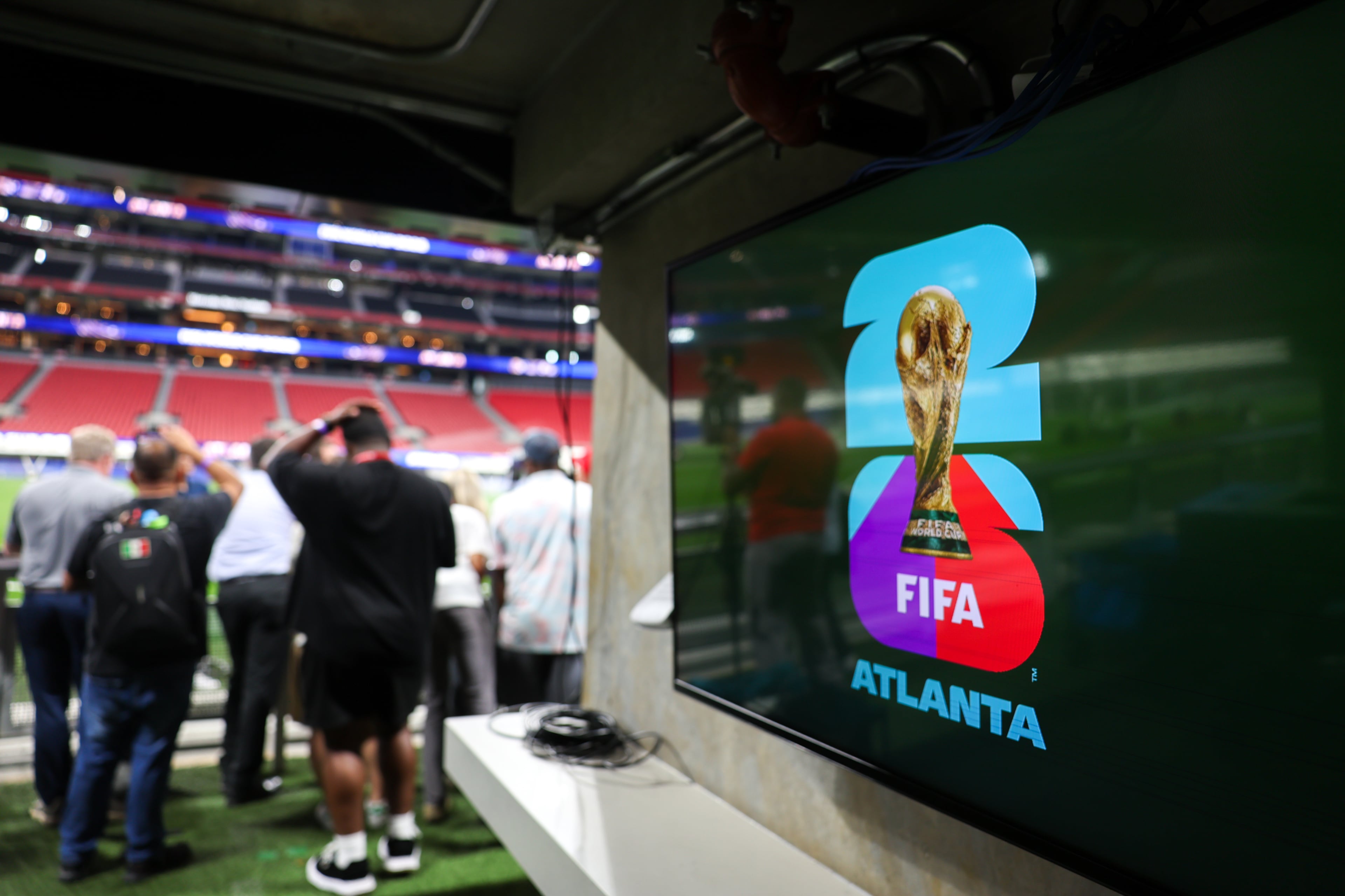 A good reminder that for many, the World Cup isn't fun and games. (Arvin Temkar/AJC)