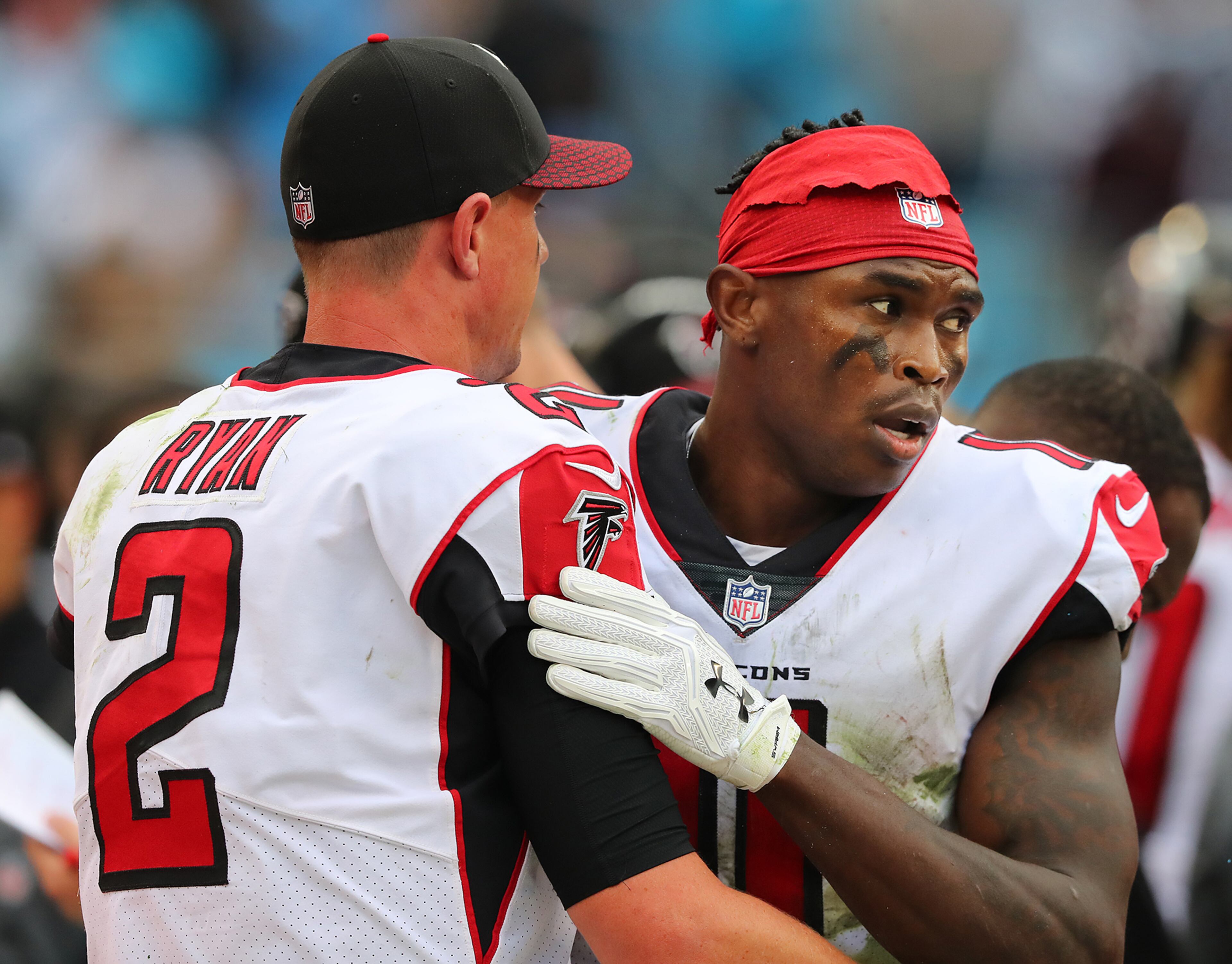 November 5, 2017 Charlotte: Falcons wide receiver Julio Jones gives quarterback Matt Ryan a hug on the sidelines after he dropped a certain touchdown pass in the endzone during the fourth quarter against the Panthers in a NFL football game on Sunday, November 5, 2017, in Charlotte. The Panthers held on to beat the Falcons 20-17. Curtis Compton/ccompton@ajc.com