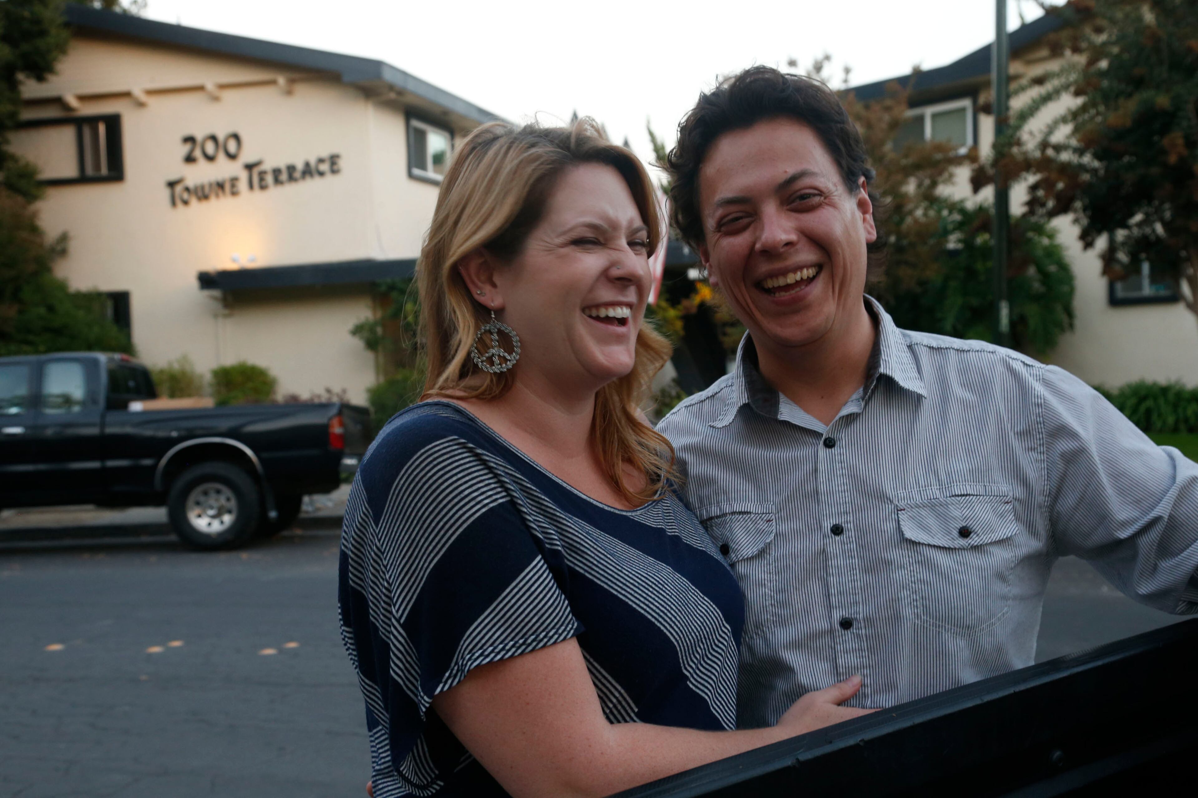 Luis Barreto and Christianne White, childhood friends in their Los Gatos, Calif., neighborhood a quarter century ago, recently reunited, becoming a couple this year. Visiting their old neighborhood on October 10, 2014, the couple shared memories of their 1989 Loma Prieta earthquake experience and their hopes for the future. (Karl Mondon/Bay Area News Group/MCT)