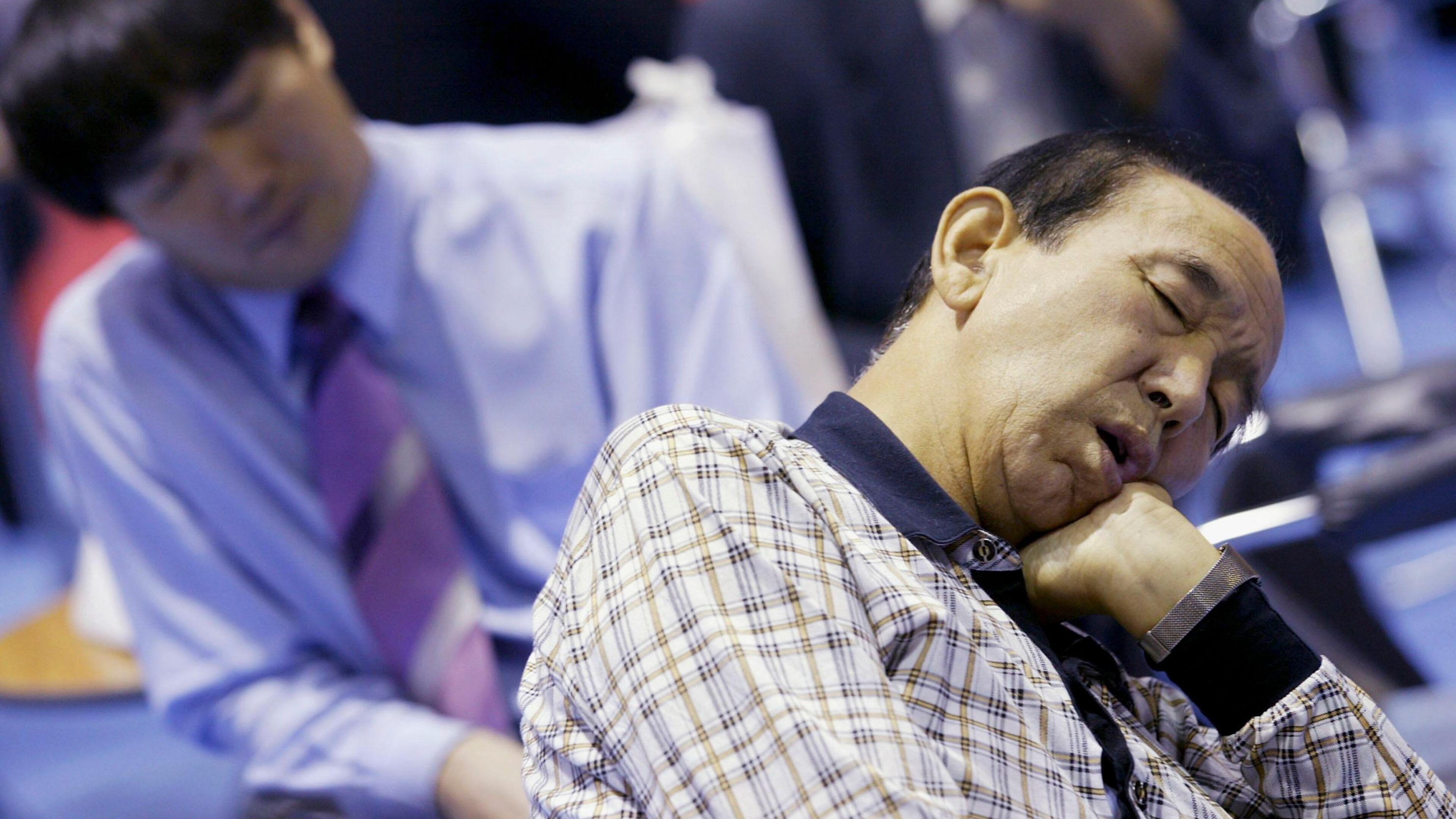 SEOUL, SOUTH KOREA - SEPTEMBER 23: Elderly South Korean job seekers sleep during an elderly persons' job fair on September 23, 2005 in Seoul, South Korea. When the percentage of those aged 65 or older to the total population is greater than 7%, the population is called an Ageing Society. South Korea has the world's fastest ageing population which could signal a death knell for South Korea's economic progress. (Photo by Chung Sung-Jun/Getty Images)