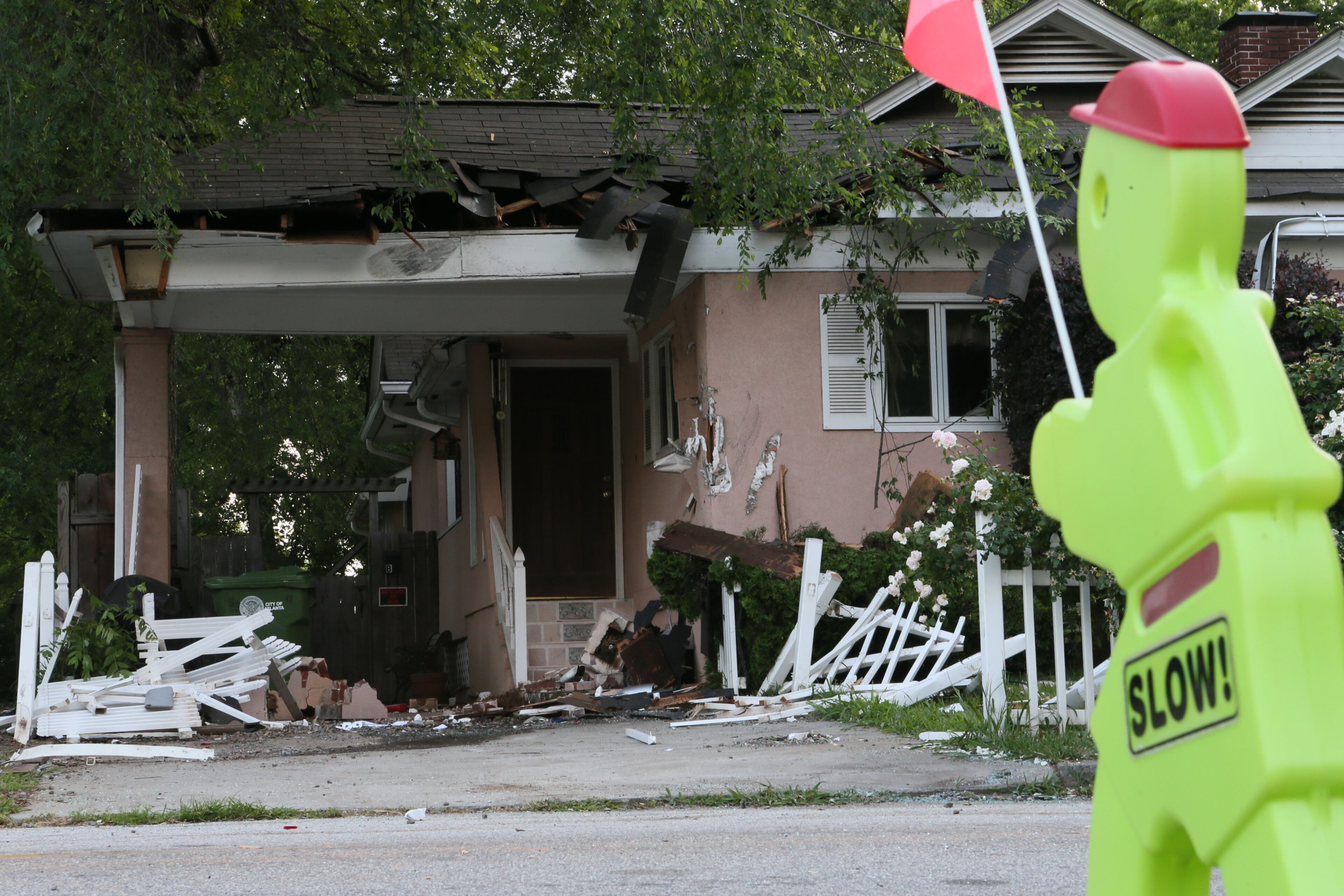 Channel 2 Action News reported that when officers tried to stop a motorist driving with no lights around 2 a.m., the driver sped off. Officers initiated a chase, but had called it off due to high speeds before the suspect slammed into at least six cars parked on Holmes Street, according to Channel 2. JOHN SPINK/JSPINK@AJC.COM