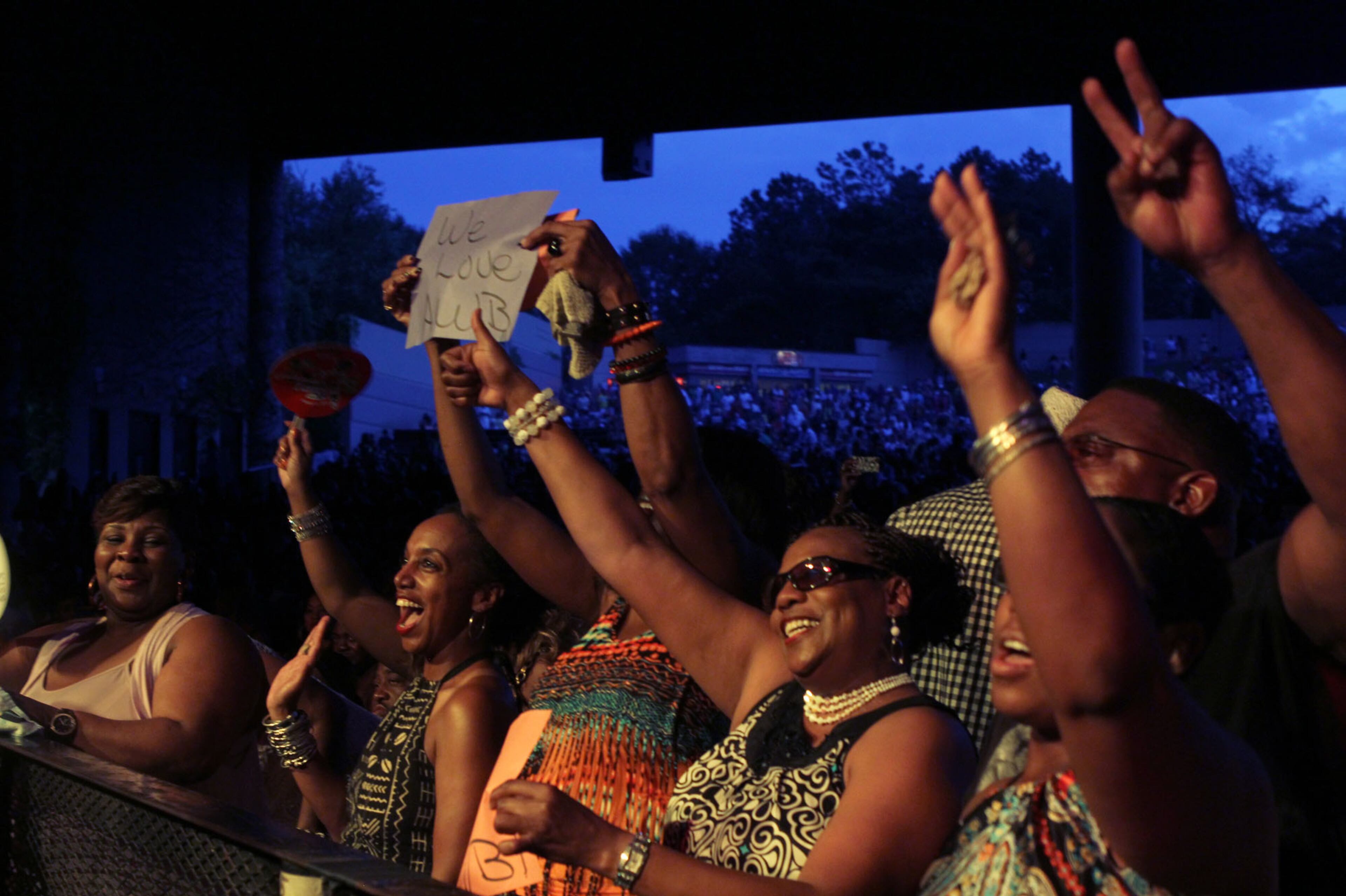 An enthusiastic audience greets the Average White Band at the 2013 Flashback Festival at Aaron's Amphitheatre at Lakewood in Atlanta on Saturday.