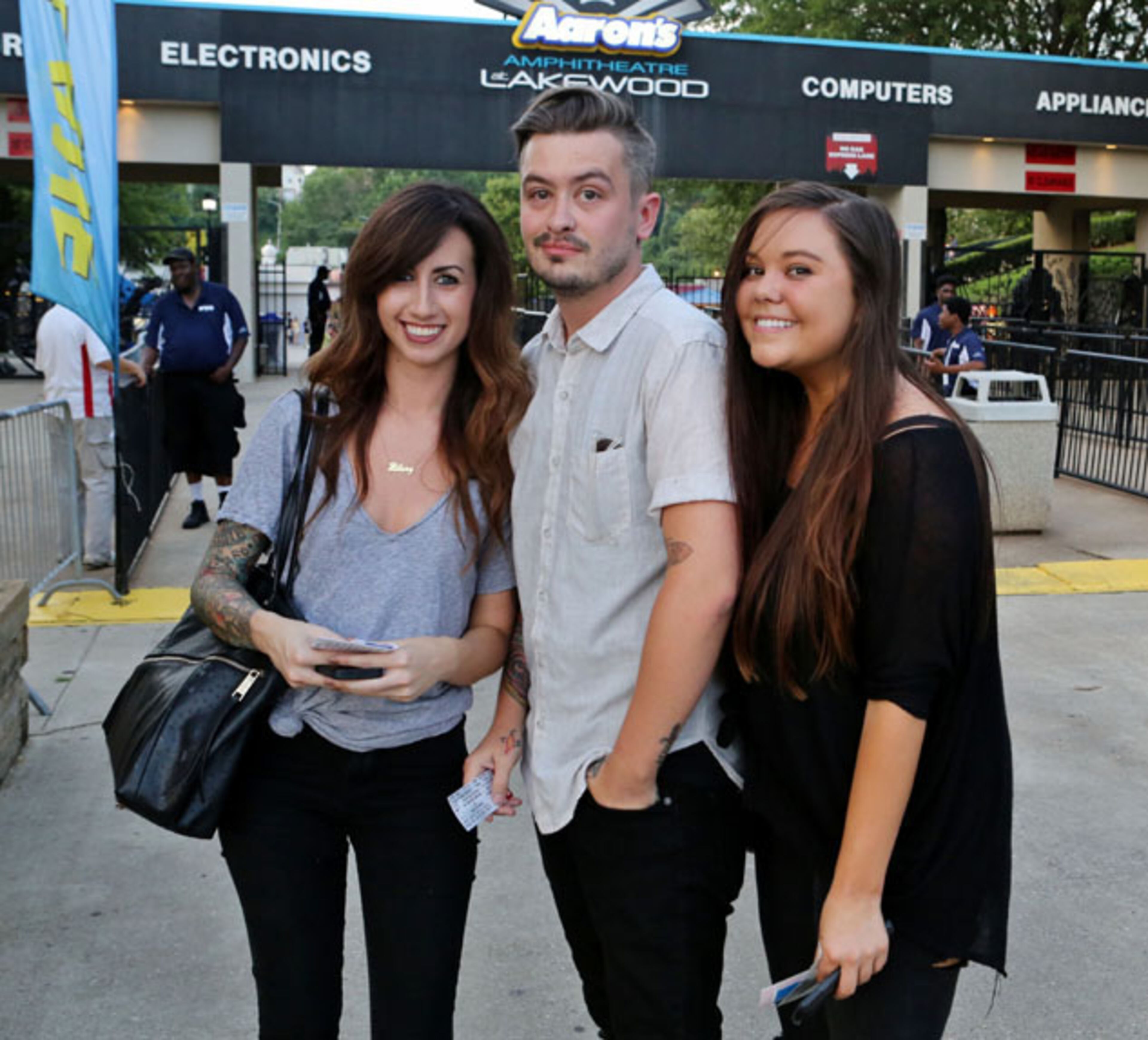 Hillary Lancaster, Connor O'Neal and Misti Lake drove in from Midtown for the concert. The Smashing Pumpkins and Marilyn Manson teamed up for the "End Times Tour", as they rocked Aaron's Amphitheatre at Lakewood in Atlanta on Saturday night, July 25, 2015. Robb D. Cohen / RobbsPhotos.com