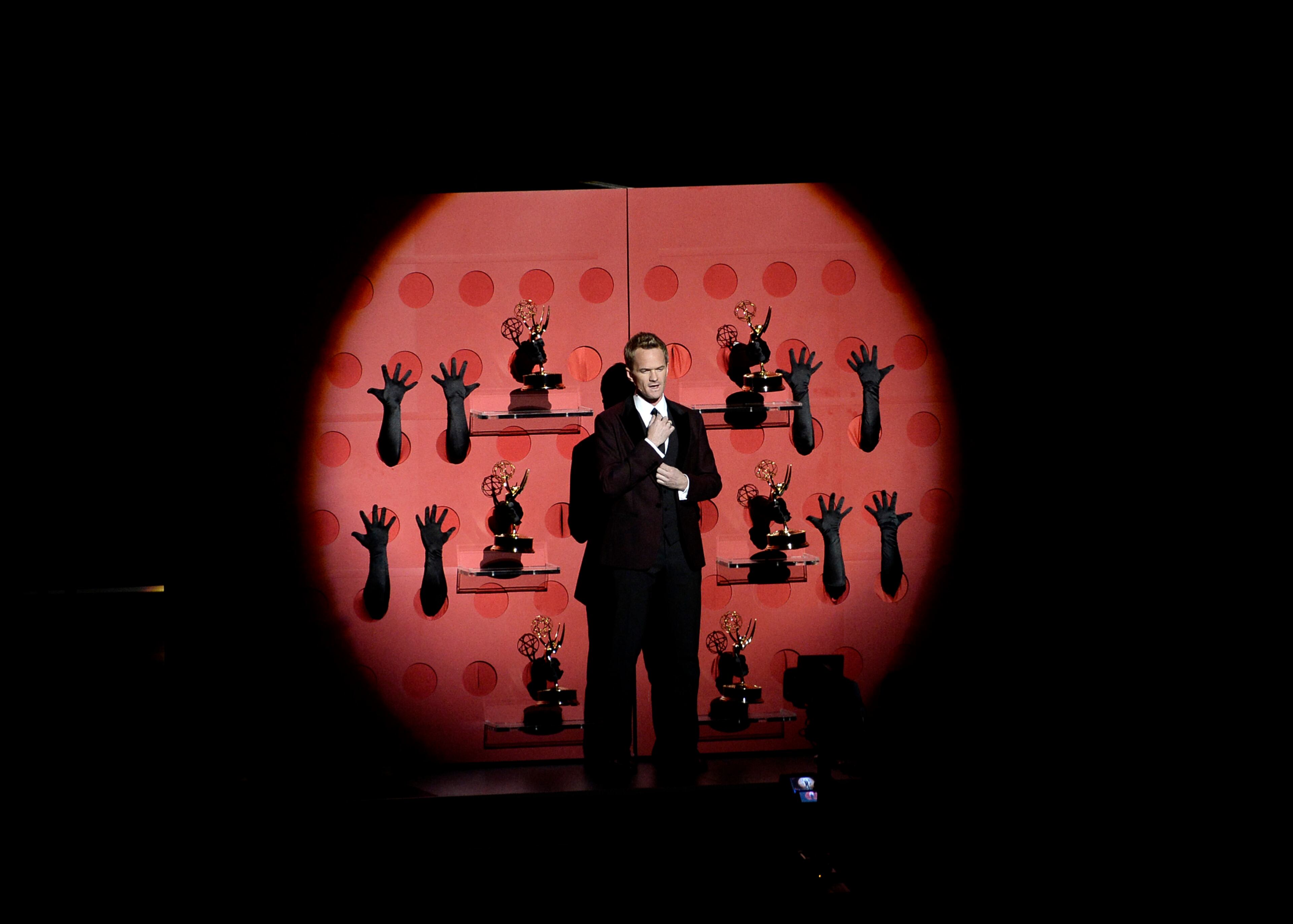 LOS ANGELES, CA - SEPTEMBER 22: Actor Neil Patrick Harris performs onstage during the 65th Annual Primetime Emmy Awards held at Nokia Theatre L.A. Live on September 22, 2013 in Los Angeles, California. (Photo by Kevin Winter/Getty Images)
