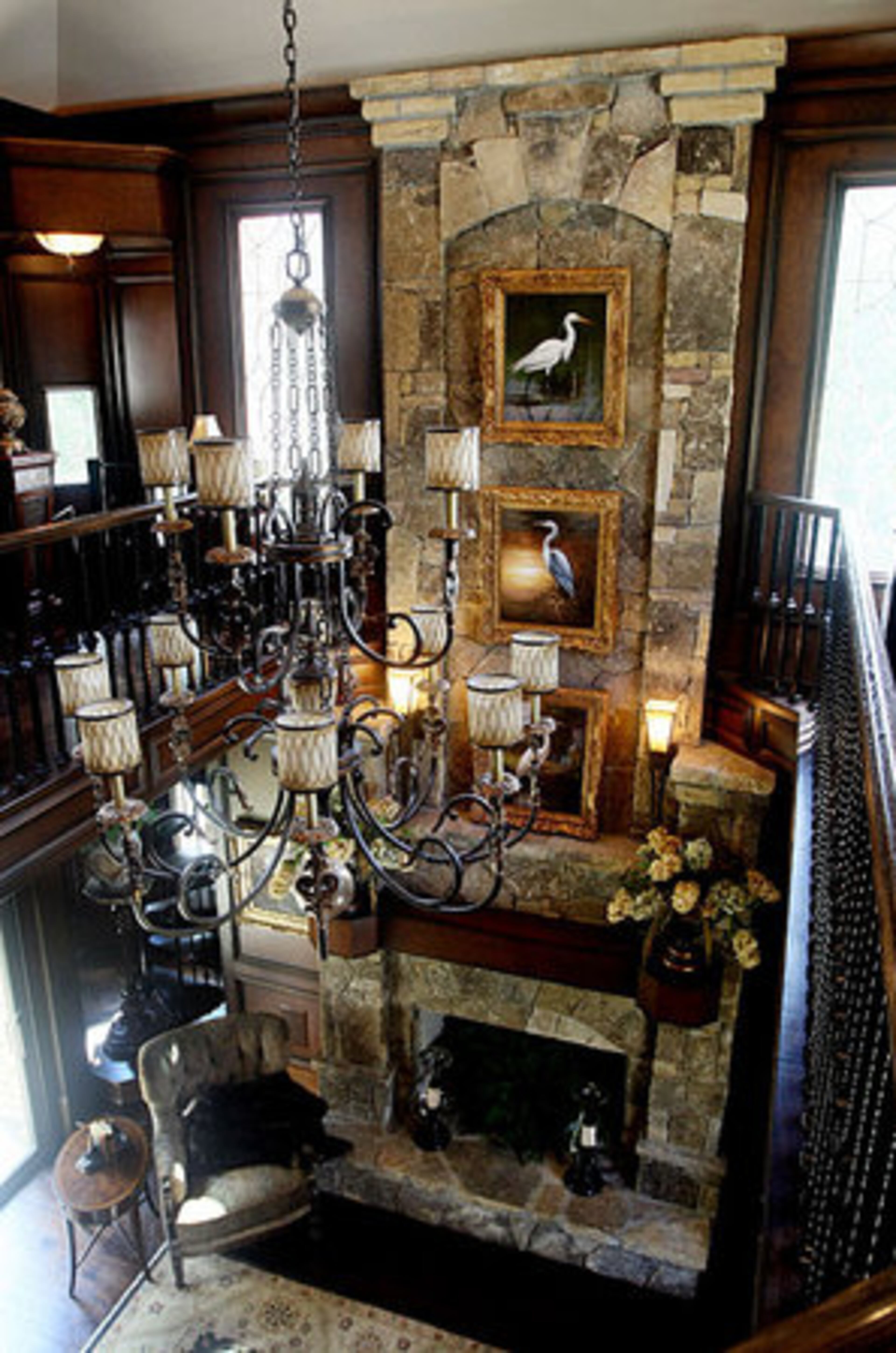 A two-story stone fireplace is surrounds Jim Rozati's interior design work. For more information go to http://www.roswellwomansclub.org or call 770-715-2700.