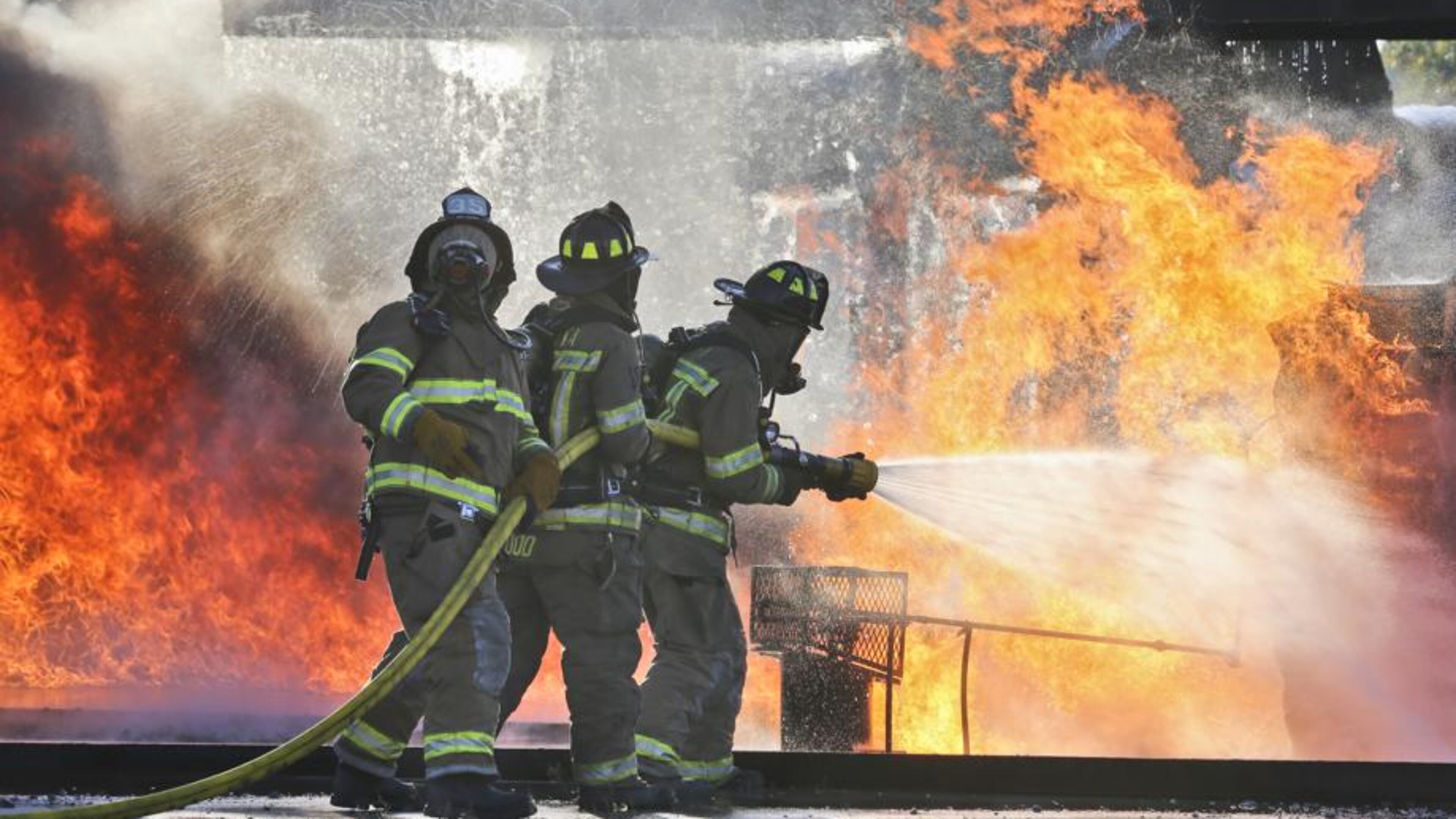 Atlanta firefighters battle a blaze during a training exercise. AJC file photo: John Spink