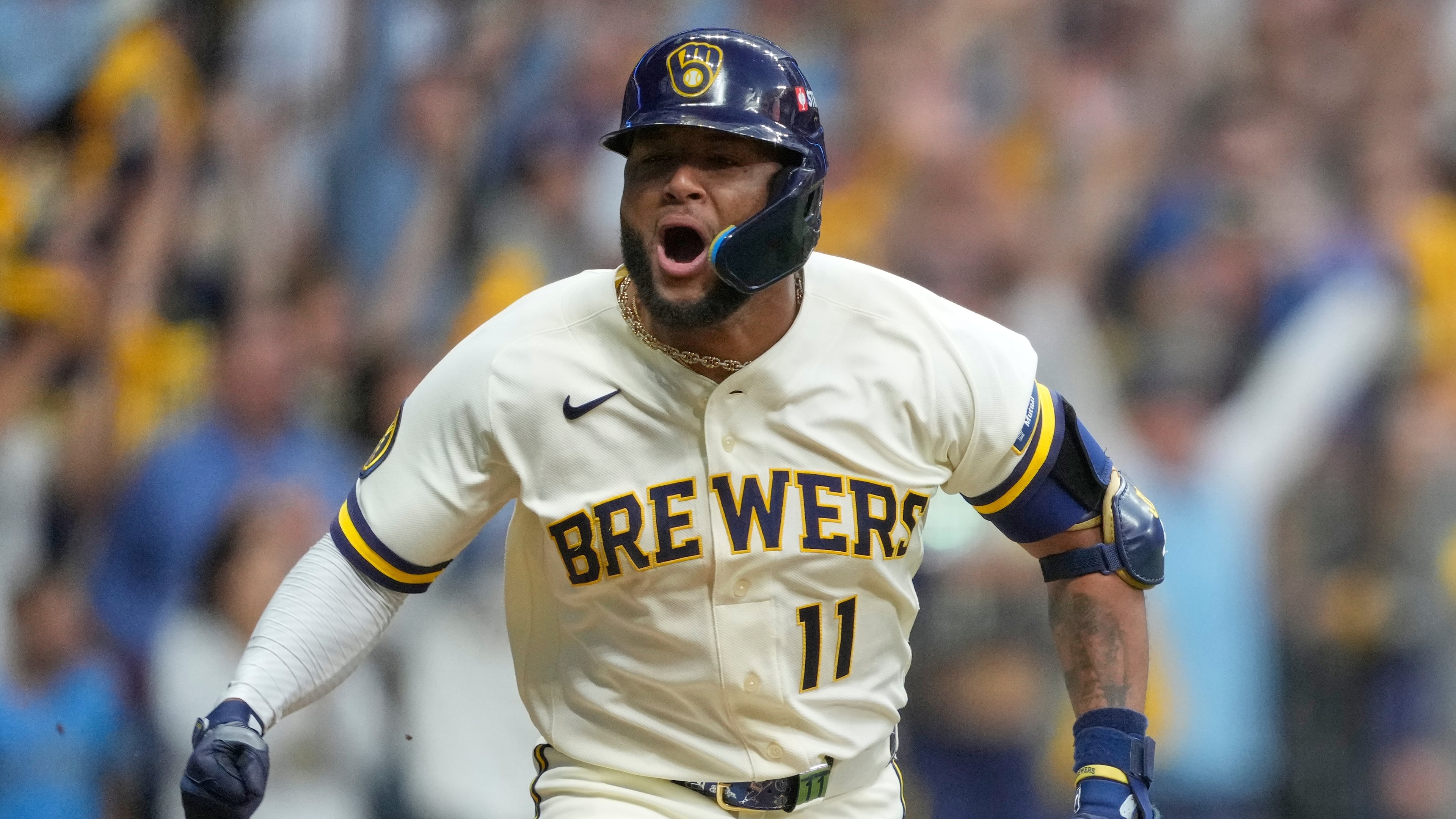 Milwaukee Brewers' Jackson Chourio celebrates after hitting a walkoff hit during the ninth inning of Game 2 of a National League Divisional baseball playoff series against the San Diego Padres Sunday, Oct. 4, 2026, in Milwaukee. (AP Photo/Kayla Wolf)