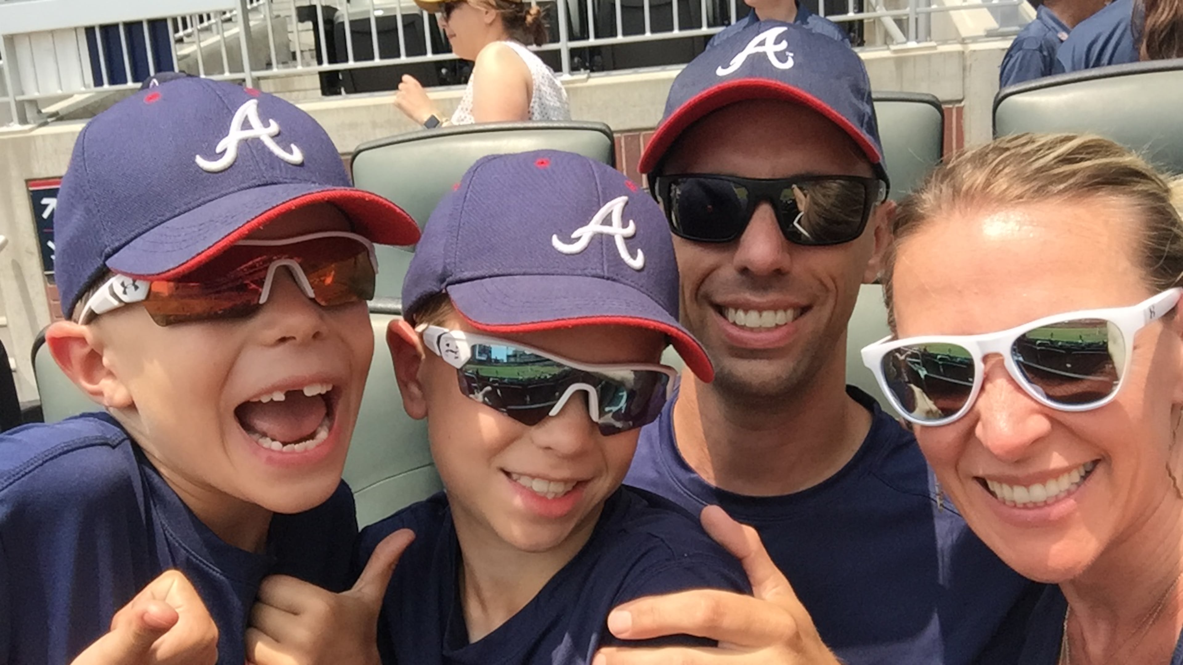 Patrick Rosa and Valerie Bolduc with their sons at a previous Braves game.