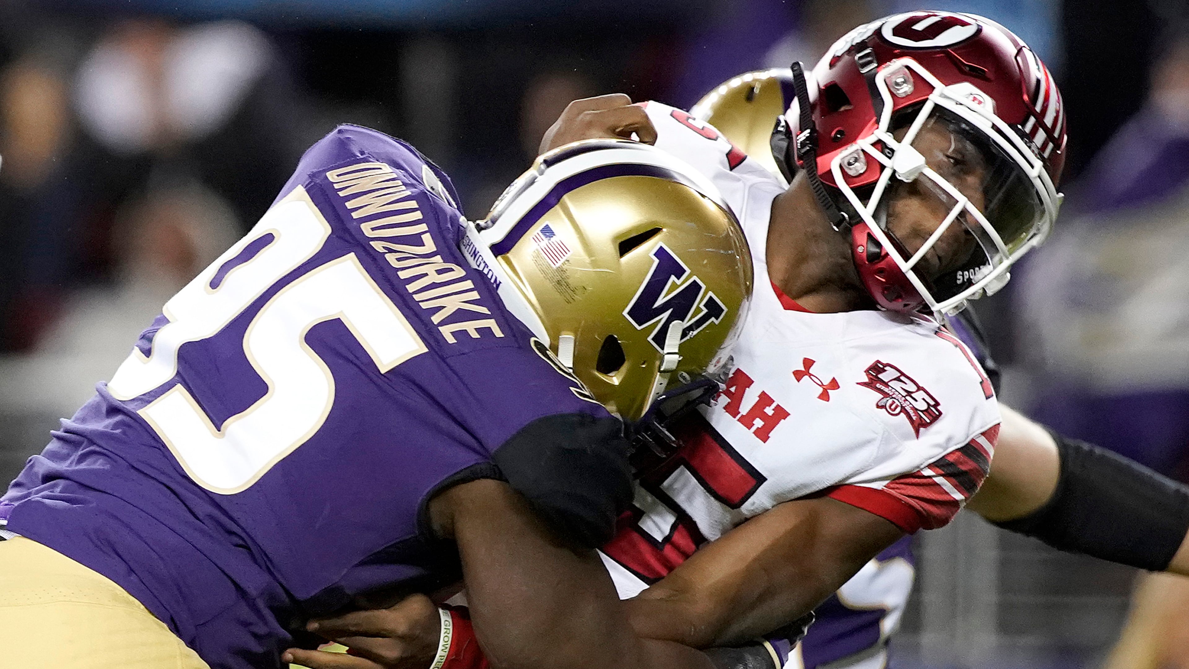 Washington defensive lineman Levi Onwuzurike (95) hits Utah quarterback Jason Shelley after Shelley threw a pass during the first half of the Pac-12 Conference championship game in Santa Clara, Calif., Friday, Nov. 30, 2018. (Tony Avelar/AP)