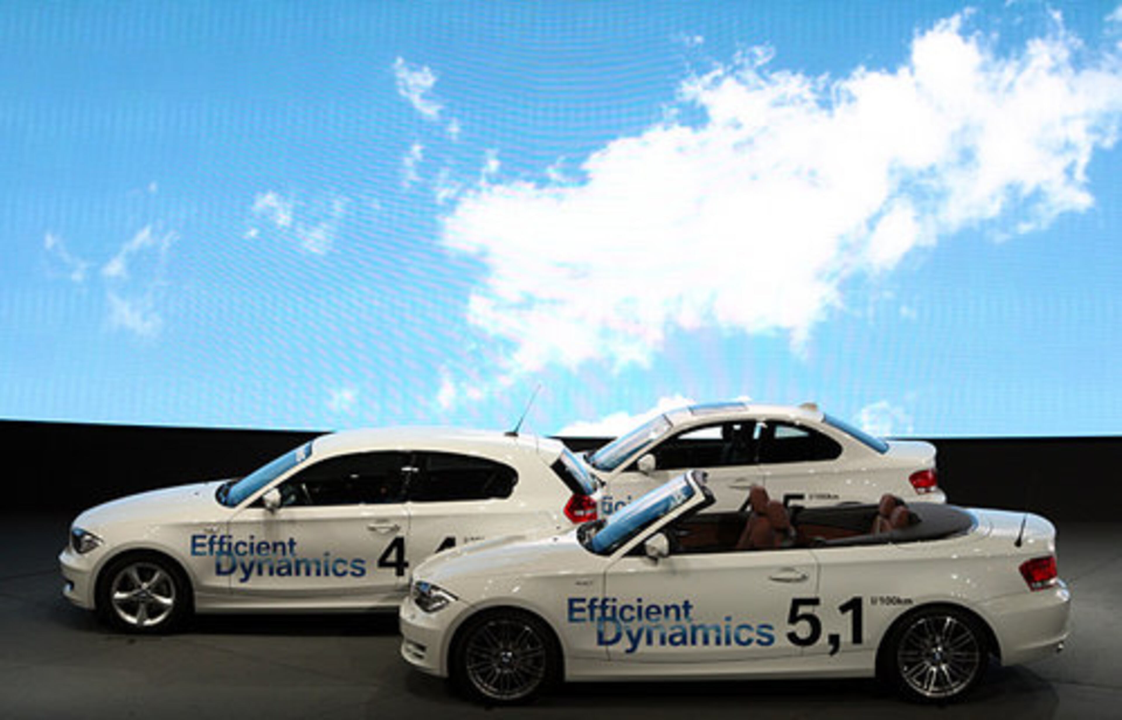 BMW 120D Efficient Dynamics automobiles sit on display.