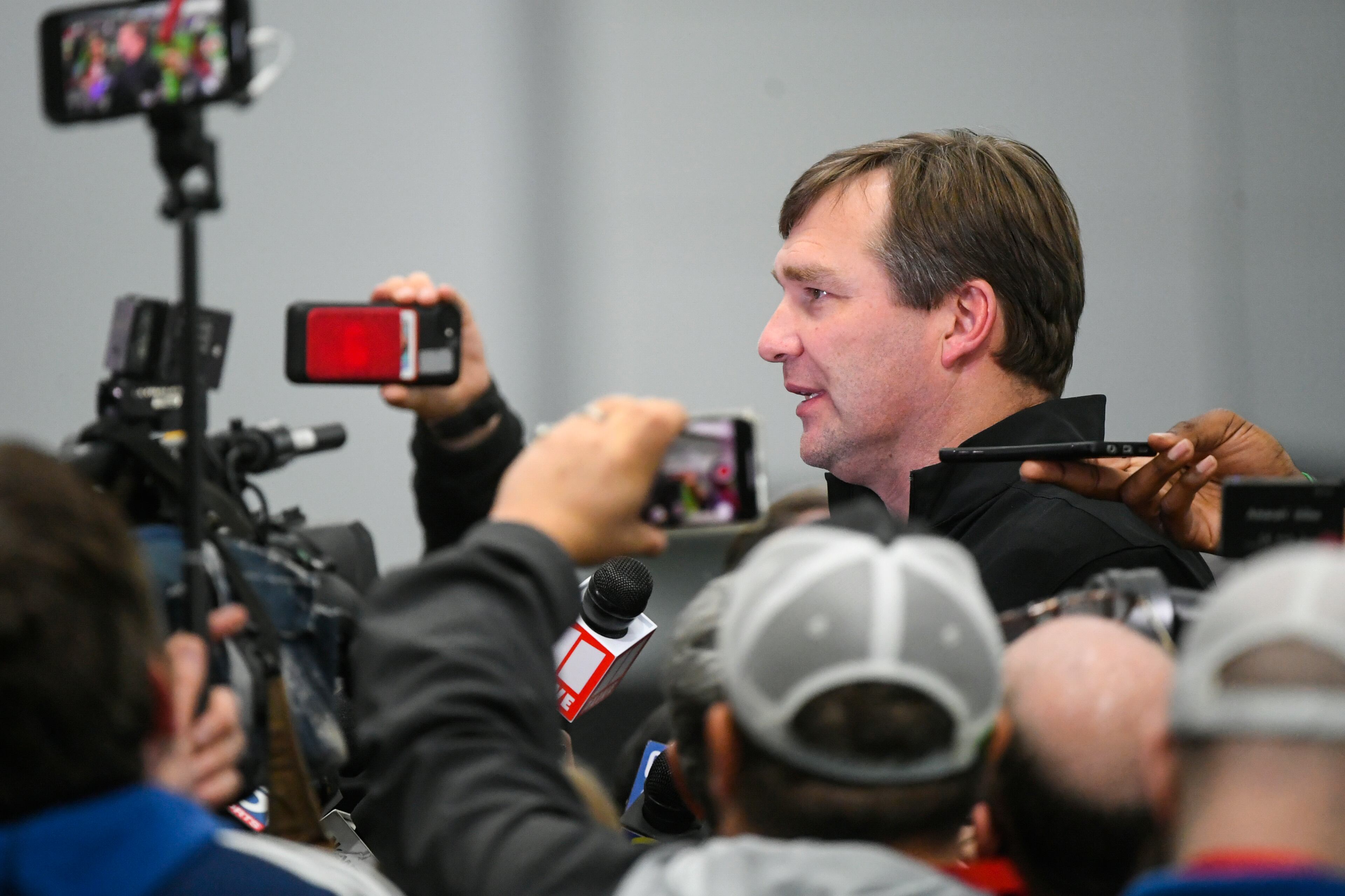 Georgia football coach Kirby Smart is interviewed by media during Georgia Pro Day, Wednesday, March 20, 2019, in Athens, Ga. (AP Photo/John Amis)