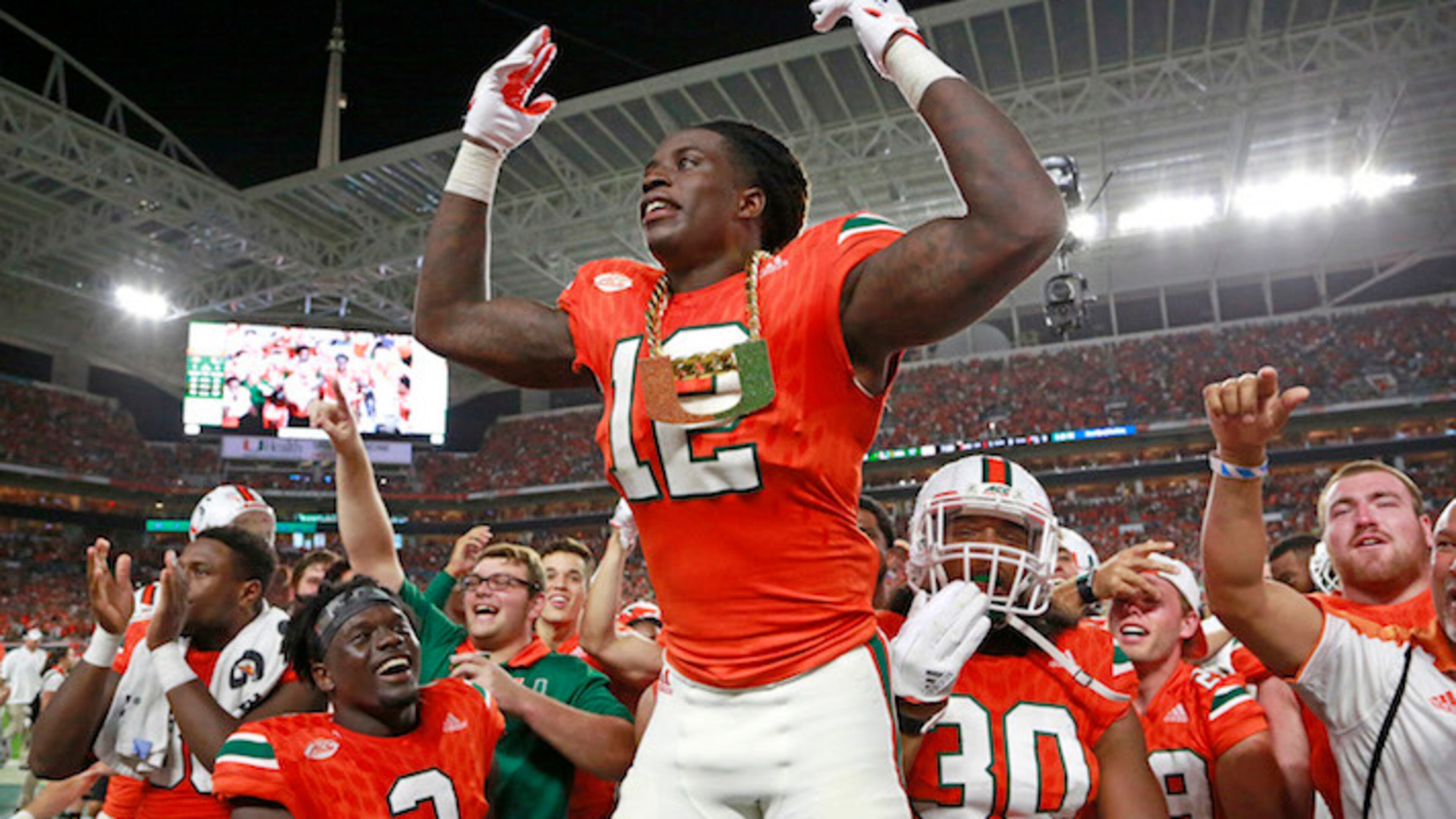 Miami Hurricanes defensive back Malek Young (12) wears the turnover chain after an interception in the second quarter against Notre Dame on November 11, 2017, at Hard Rock Stadium in Miami Gardens, Fla. (Al Diaz/Miami Herald/TNS)