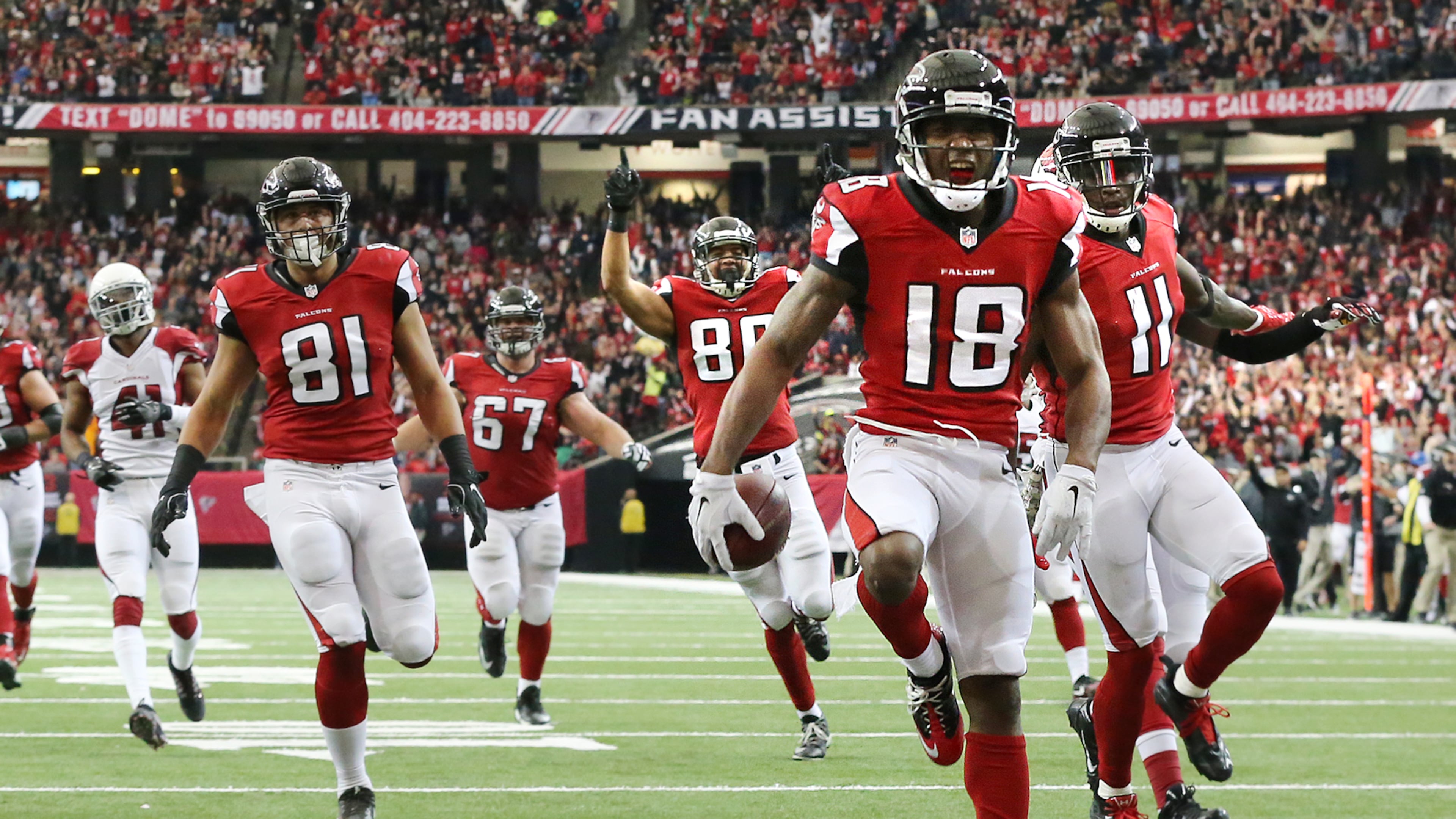 Falcons receiver Taylor Gabriel sprints gladly into the endzone against Arizona. (Curtis Compton/ccompton@ajc.com)