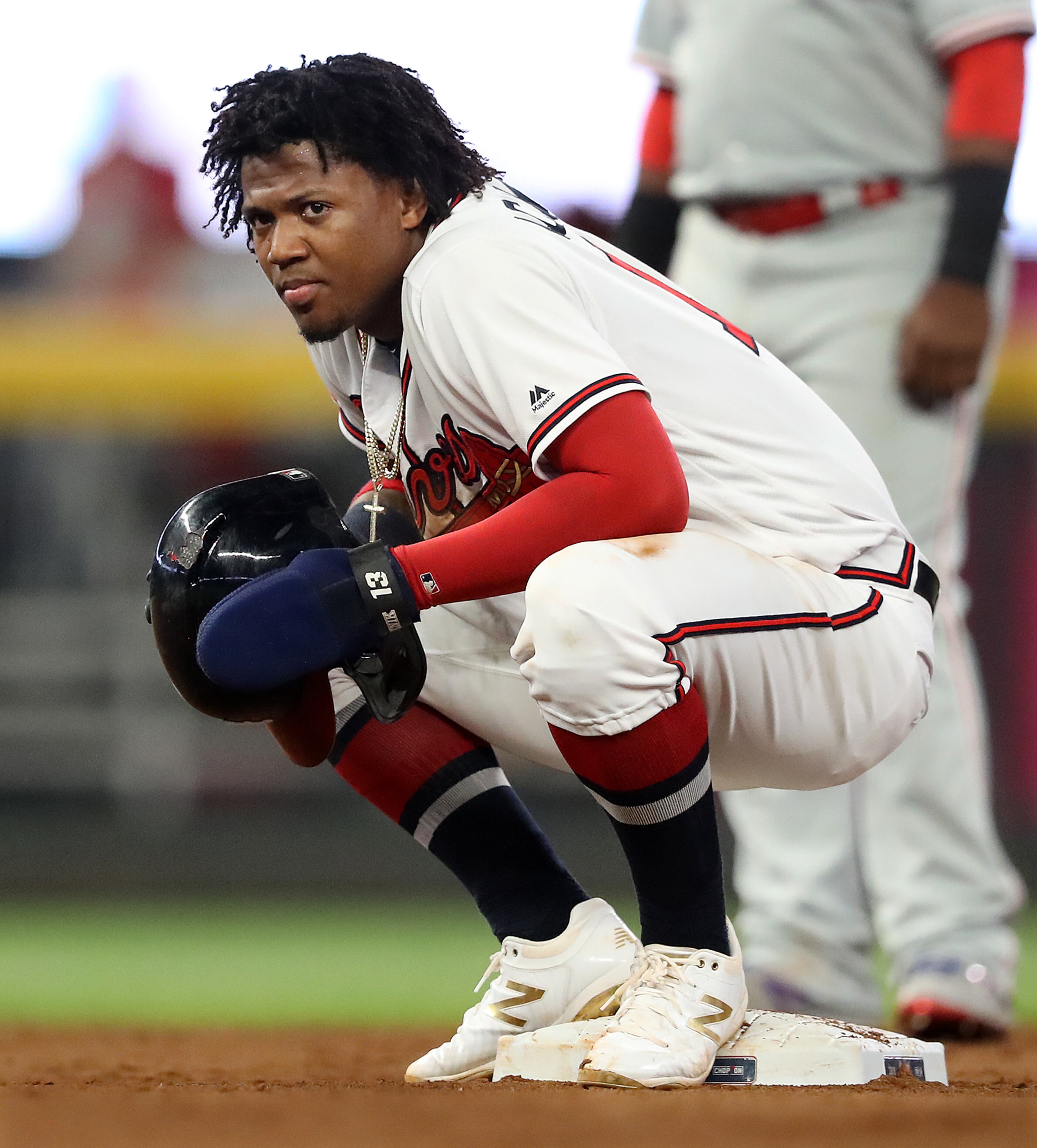 Ronald Acuna Jr. sits on second base after stealing against the Philadelphia Phillies during the 9th inning. Curtis Compton/ccompton@ajc.com