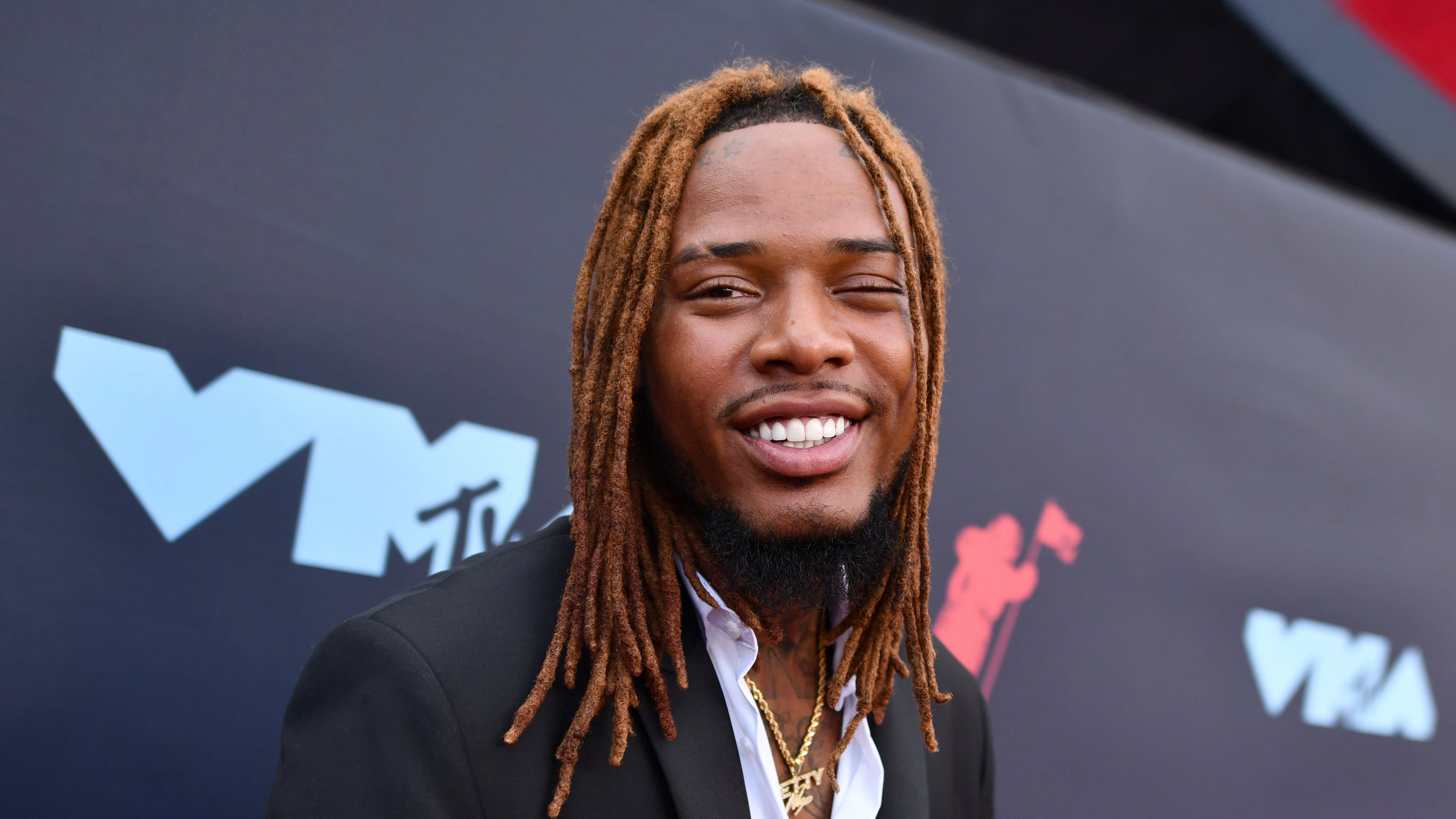 FILE - Fetty Wap arrives at the MTV Video Music Awards at the Prudential Center on Aug. 26, 2019, in Newark, N.J. (Photo by Charles Sykes/Invision/AP, File)