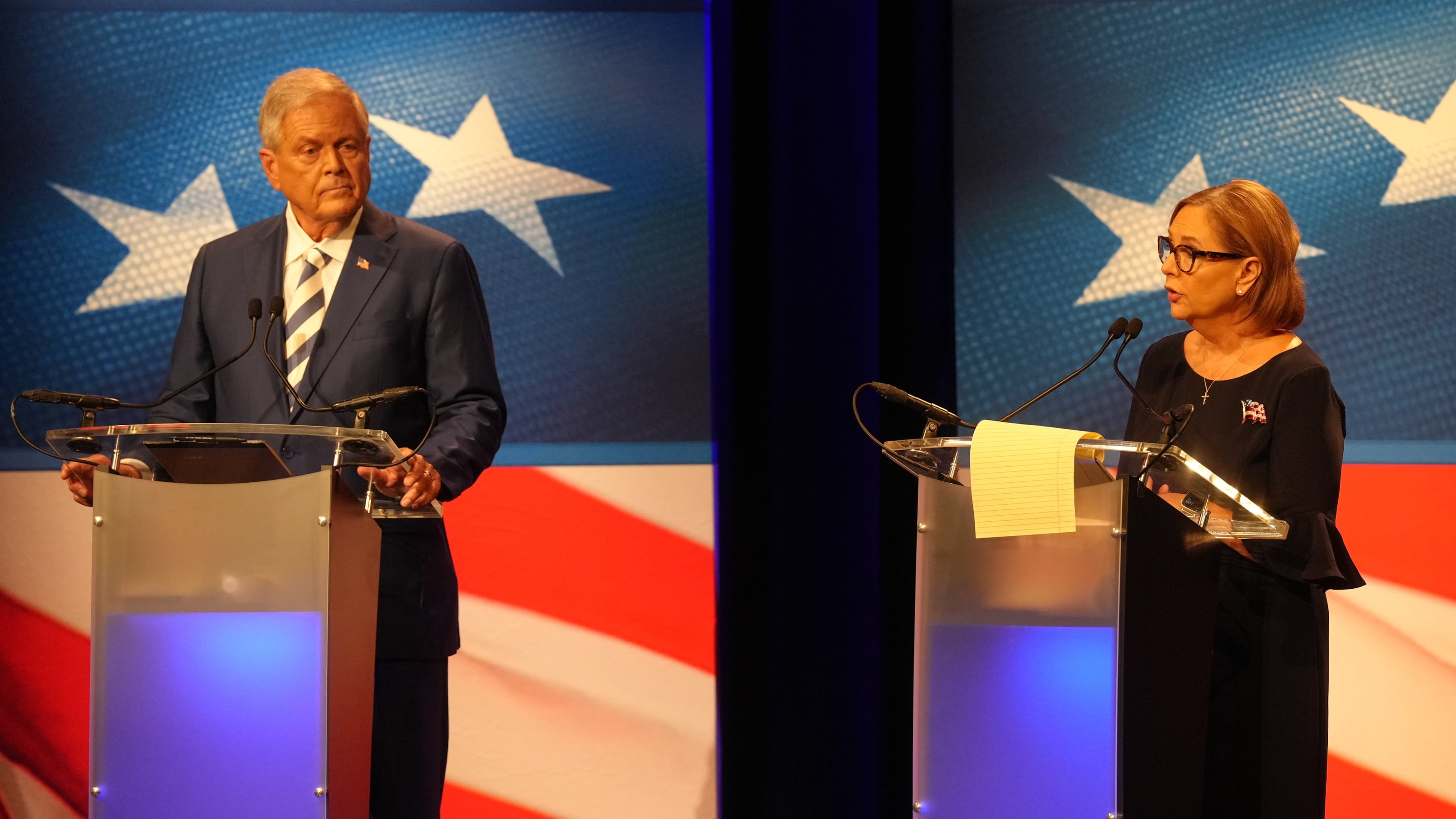 U.S. Rep. Ralph Norman, R-S.C., left, looks on as Sen. Darline Graham, R-S.C., speaks during a debate ahead of the special GOP Senate runoff election to replace the late Sen. Lindsey Graham, R-S.C., in Newberry, S.C., Tuesday, Aug. 18, 2026. (AP Photo/Meg Kinnard)