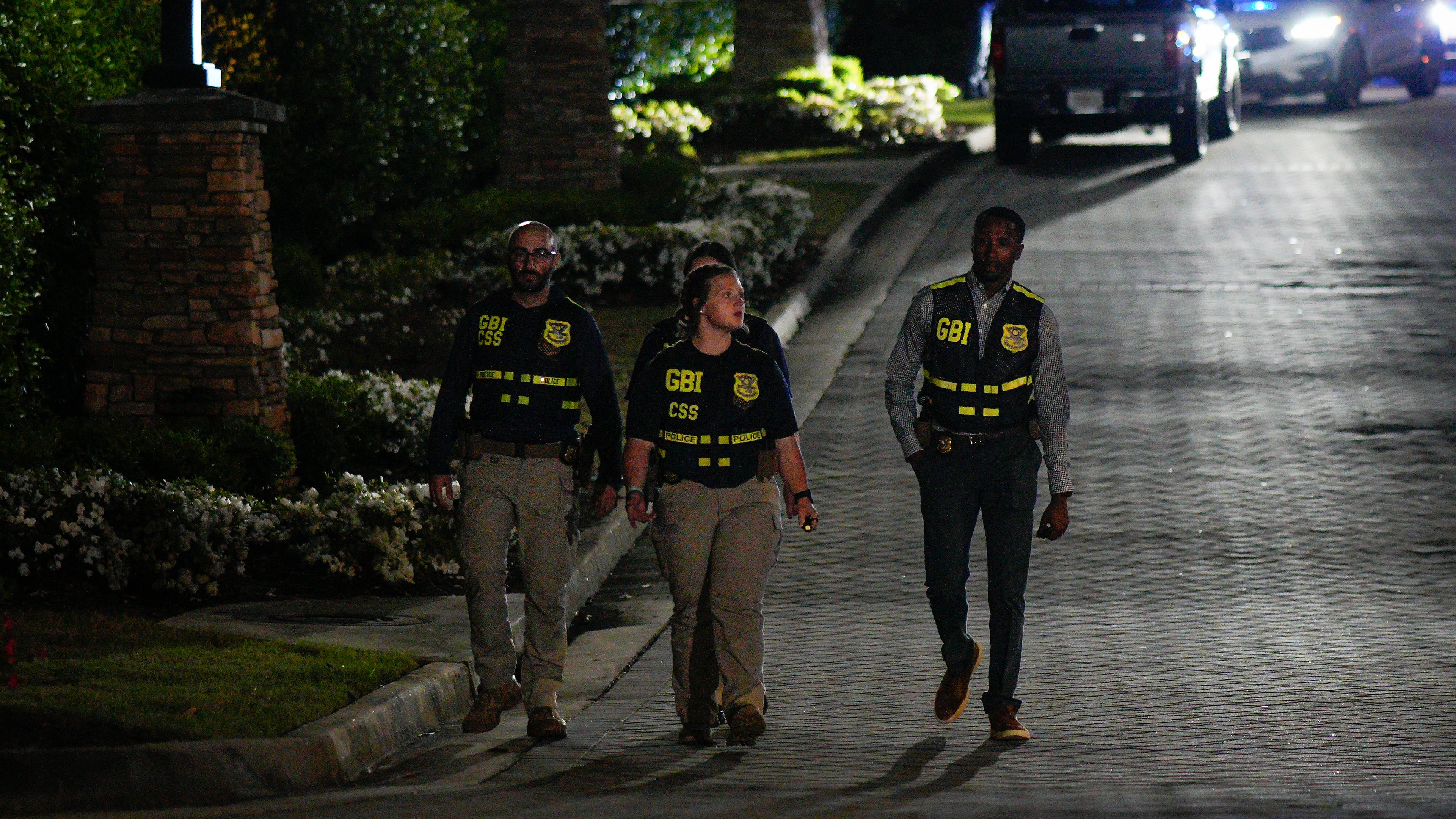 GBI officers investigate late Tuesday after Cobb police searched for a man wanted on an outstanding warrant for murder. The man, identified as 31-year-old Damian Strozier, has been located, according to Cobb police.