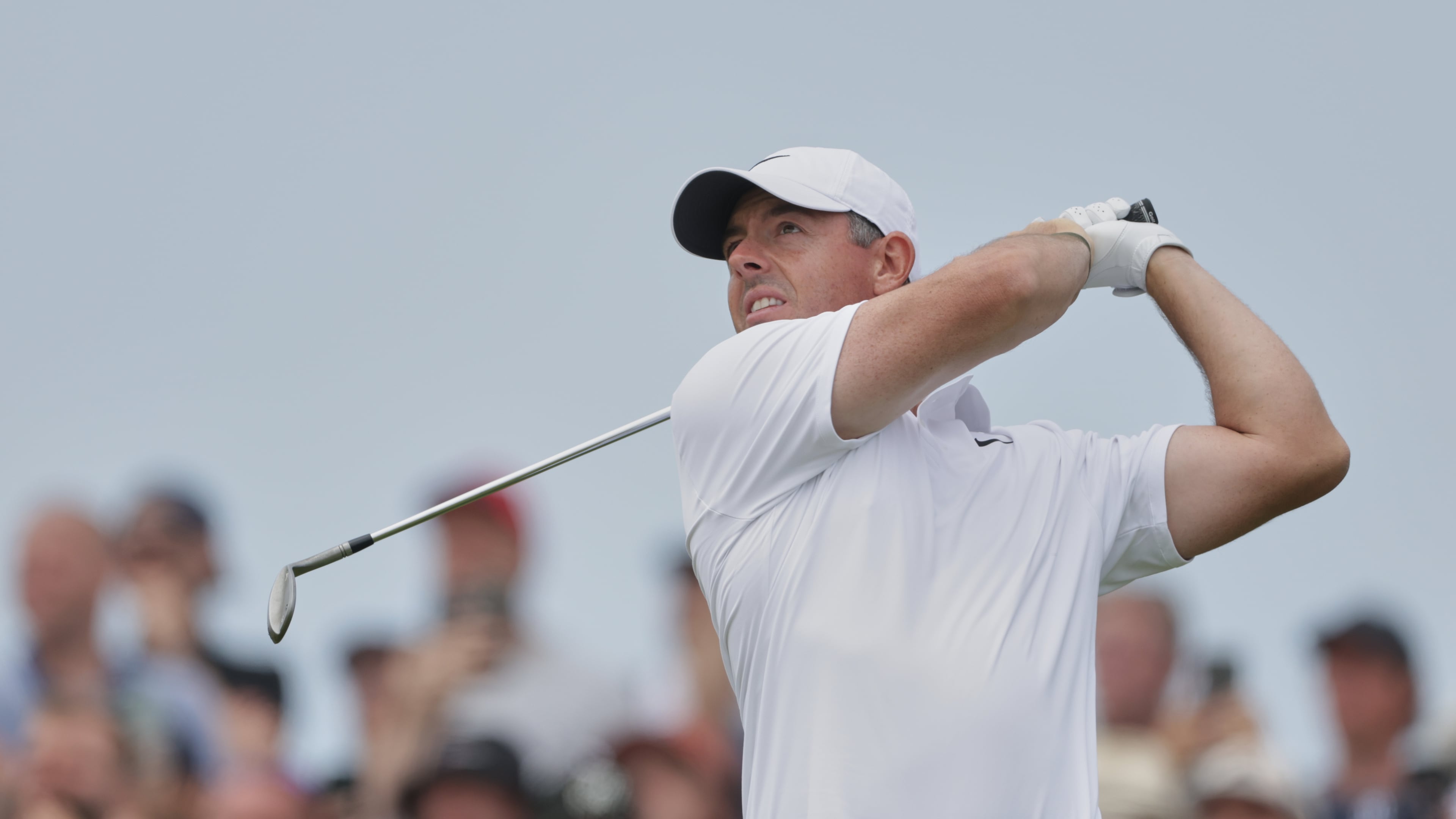 Rory McIlroy of Northern Ireland plays his tee shot on the 7th hole during the third day of the British Open Golf championships at Royal Birkdale golf club, in Southport, England, Saturday, July 18, 2026. (AP Photo/Peter Morrison)