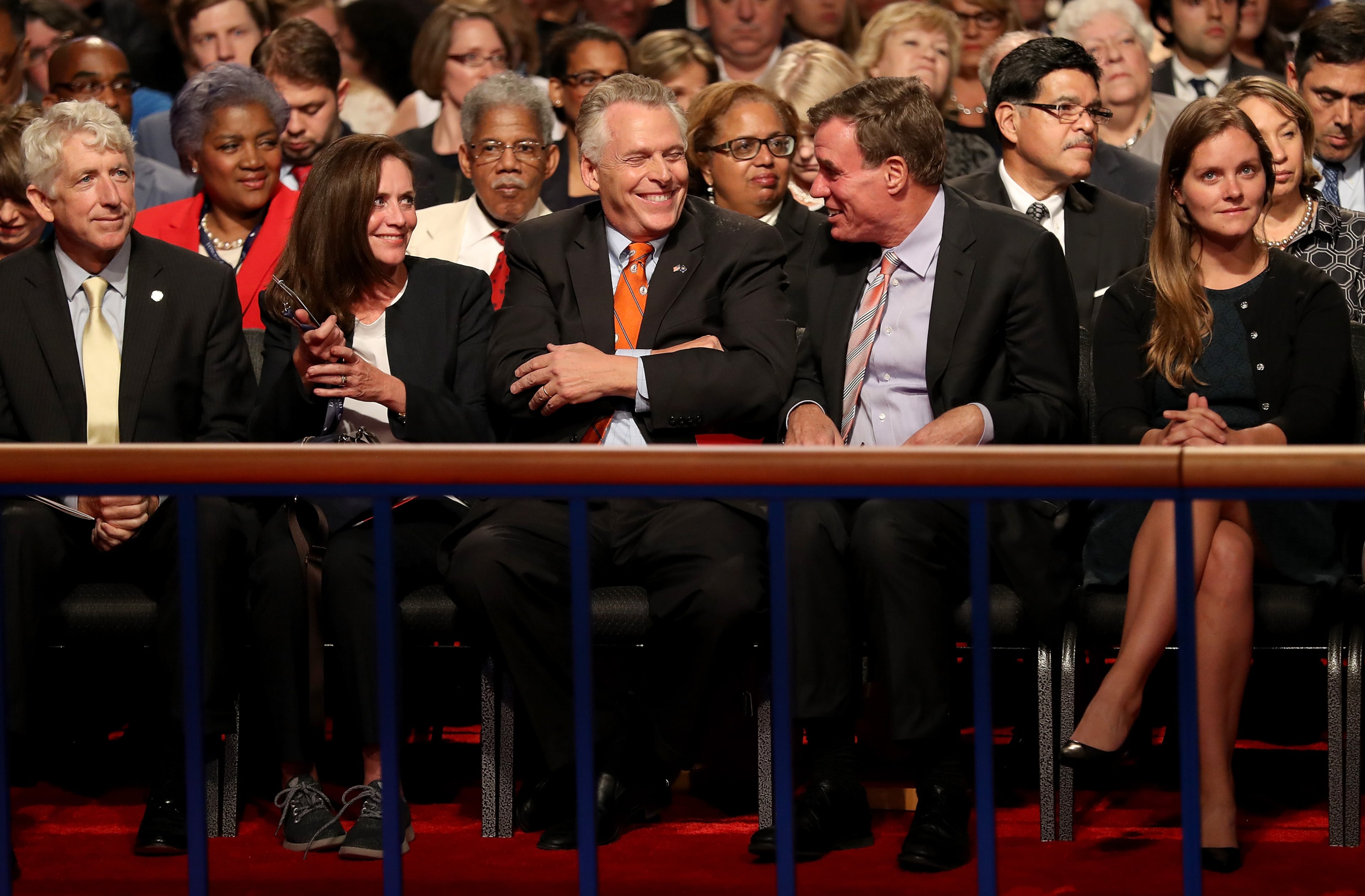 Virginia Gov. Terry McAuliffe (C) and Sen. Mark Warner (D-VA) (2R) attend the vice presidential debate between Democratic nominee Tim Kaine and Republican nominee Mike Pence at Longwood University on Oct. 4, 2016 in Farmville, Virginia. This is the second of four debates during the presidential election season and the only debate between the vice presidential candidates. (Photo by Joe Raedle/Getty Images)