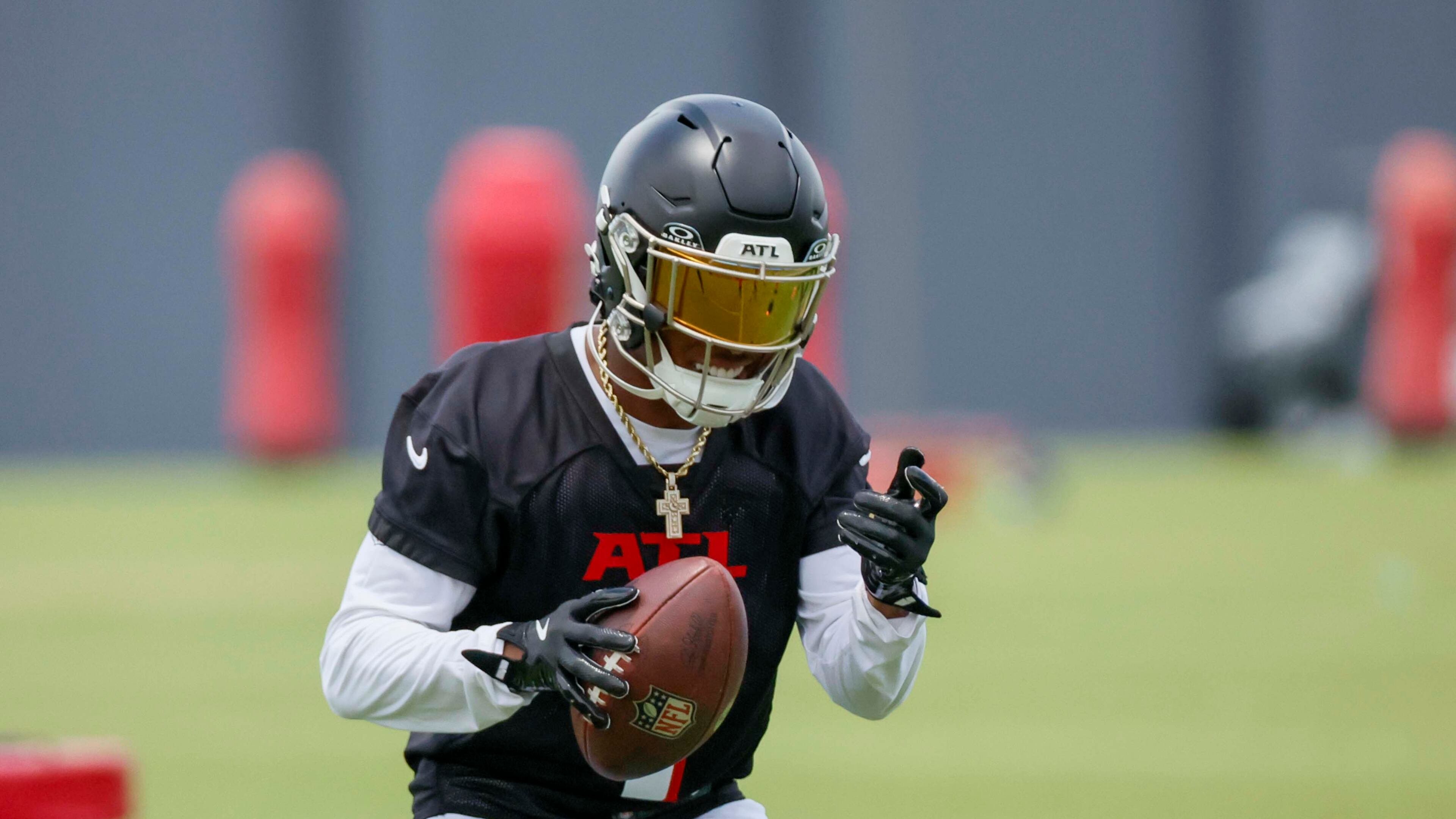 Falcons wide receiver Darnell Mooney, shown here at minicamp in June, suffered a shoulder injury last week during practice that will cause him to miss a few weeks. (Miguel Martinez/AJC)