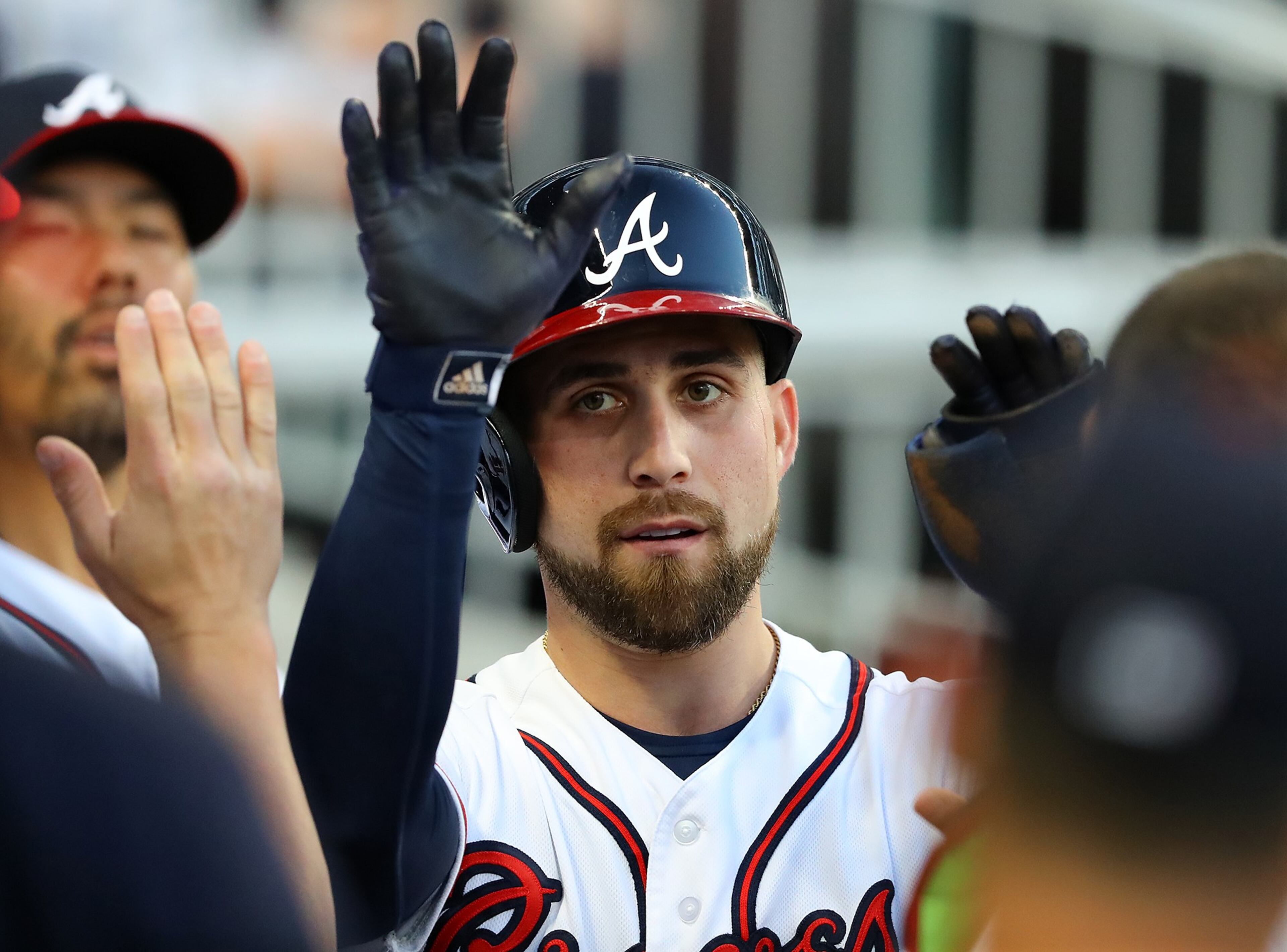 April 17, 2018 Atlanta: Braves Ender Inciarte gets high fives scoring on a RBI single by Preston Tucker for a 1-0 lead over the Phillies during the first inning in a MLB baseball game on Tuesday, April 17, 2018, in Atlanta. Curtis Compton/ccompton@ajc.com