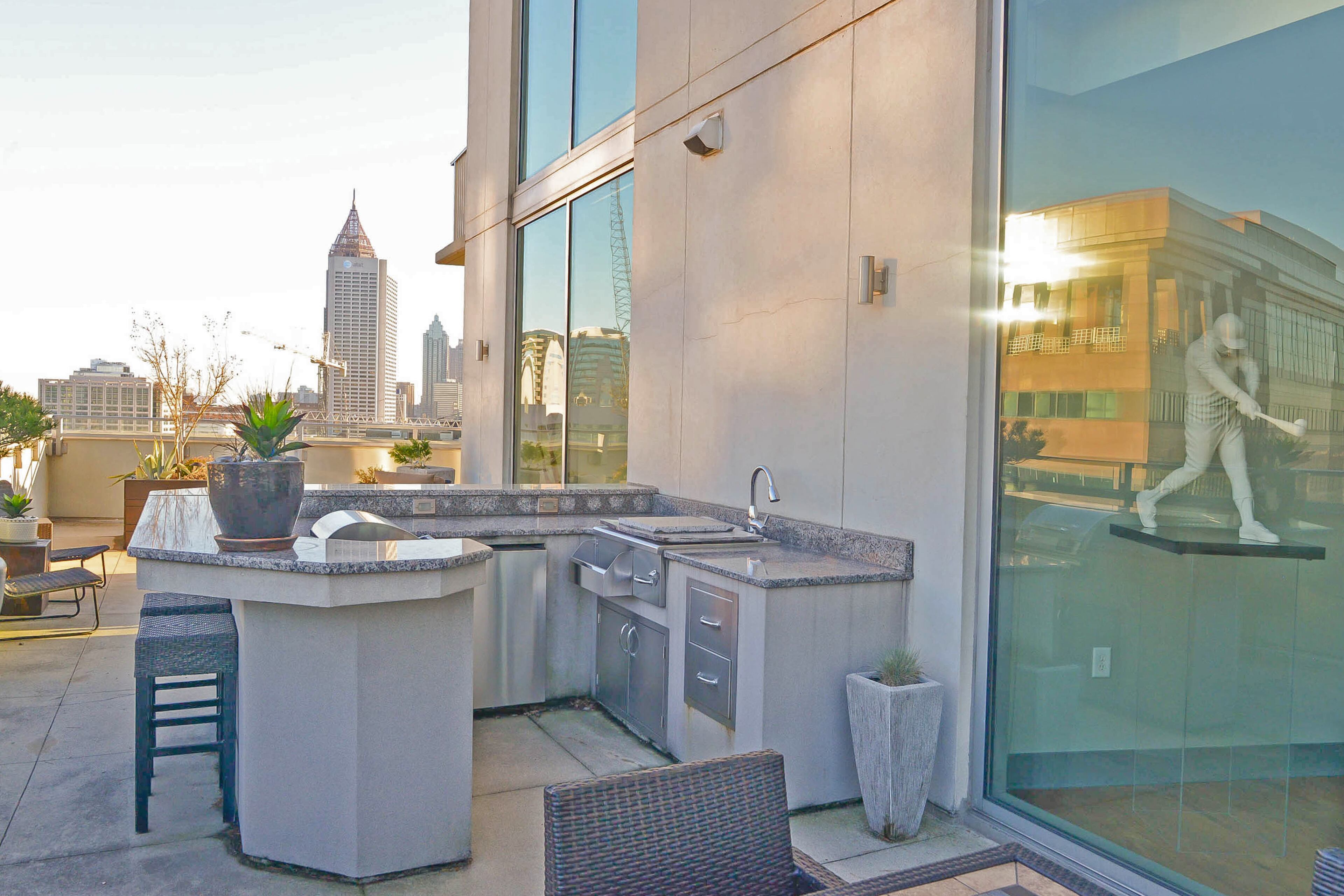 The contemporary condo was built in 2007, and when the homeowners purchased it in 2012, they removed the huge hot tub on the terrace.