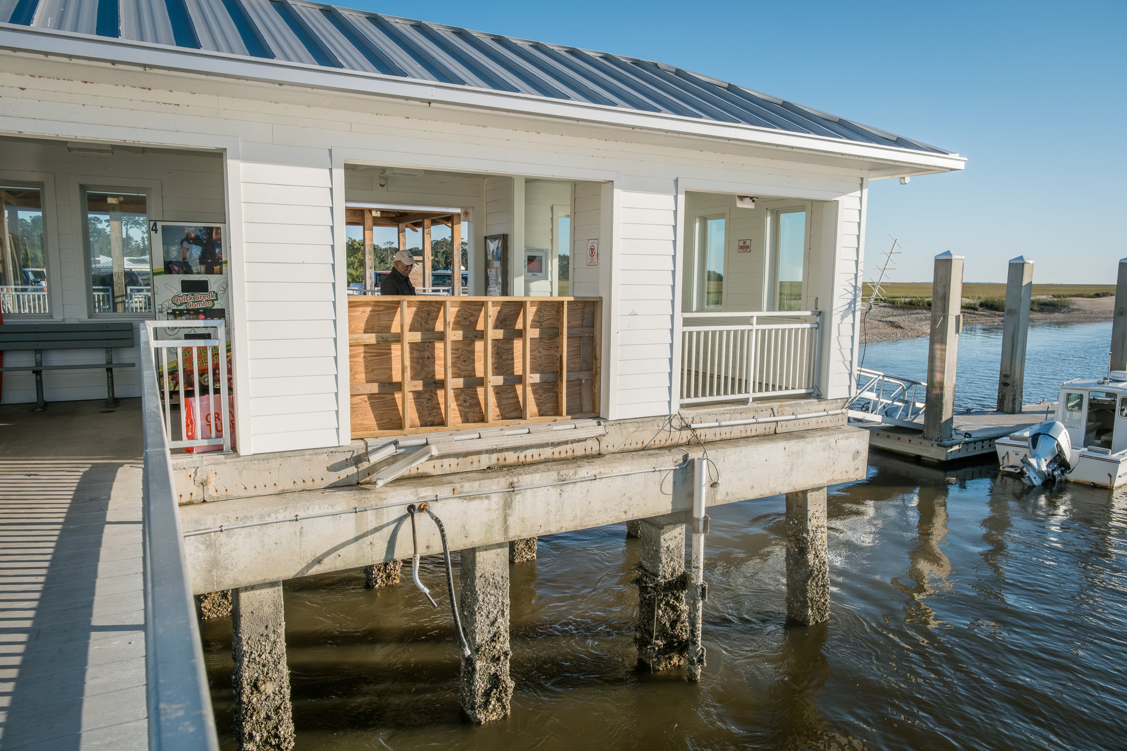 The collapse happened Oct. 19 during the annual Cultural Day celebration on Sapelo Island. There were an estimated 40 people on the metal gangway when it buckled, sending about 20 plummeting into the river below, authorities said. (Justin Taylor for the AJC)