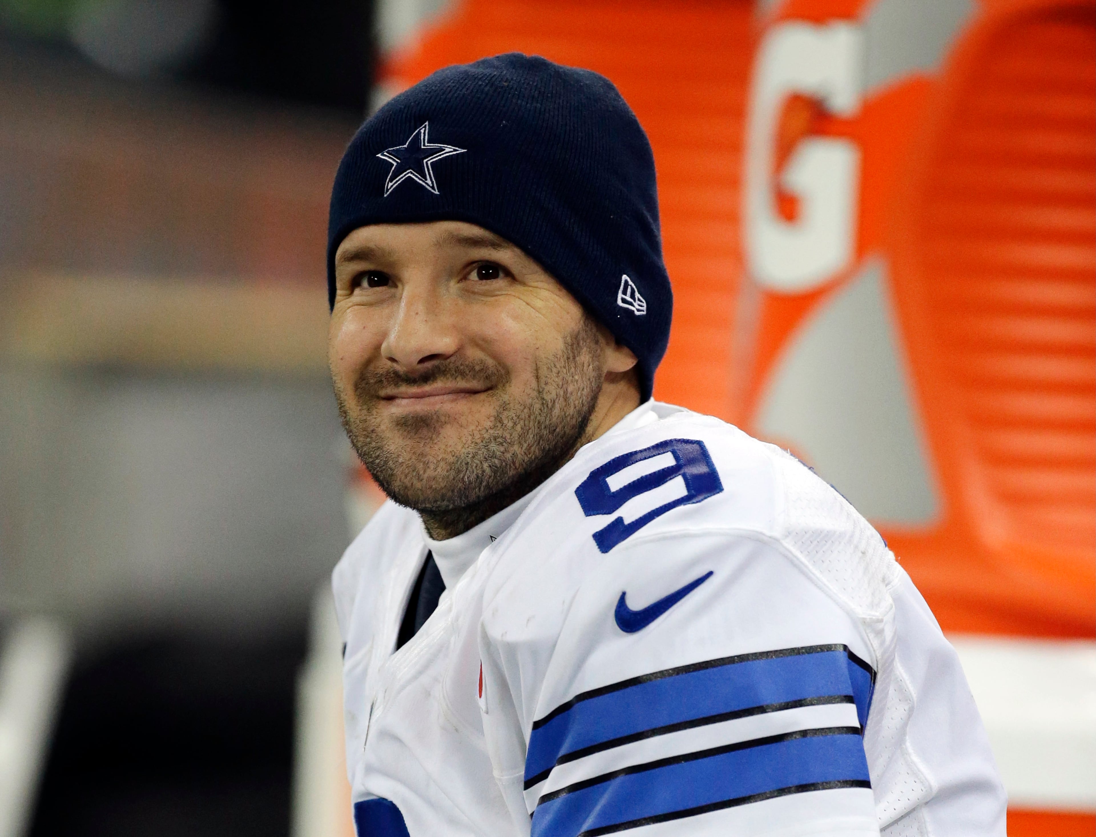 Dallas Cowboys quarterback Tony Romo acknowledges spectators after their 31-17 victory over the Jacksonville Jaguars during the NFL football game at Wembley Stadium, London, Sunday, Nov. 9, 2014. (AP Photo/Tim Ireland)