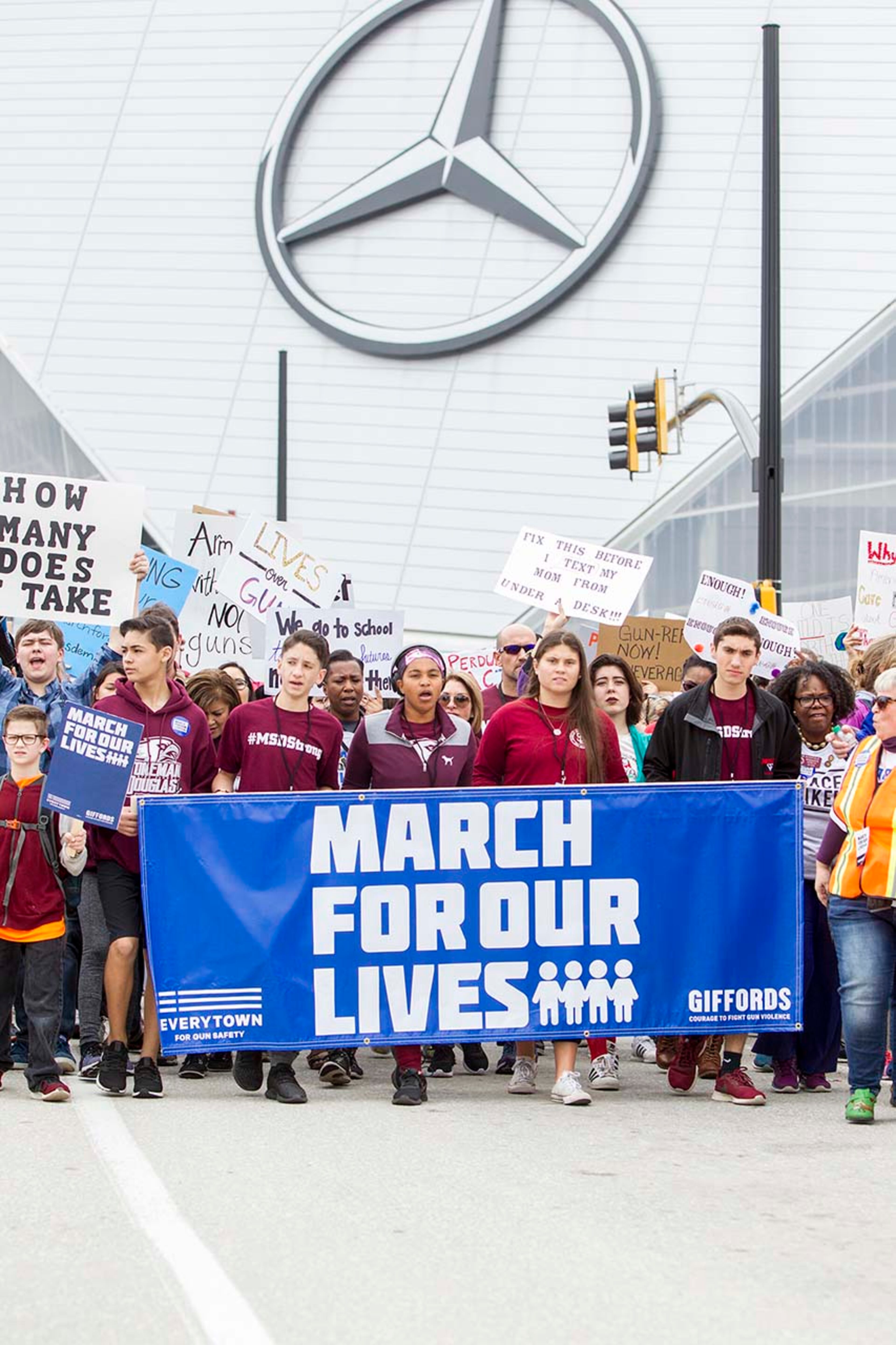 Parkland shooting survivors march through the streets of Downtown Atlanta during the March for our Lives event in Atlanta, Georgia, on Saturday, March 24, 2018. (REANN HUBER/REANN.HUBER@AJC.COM)