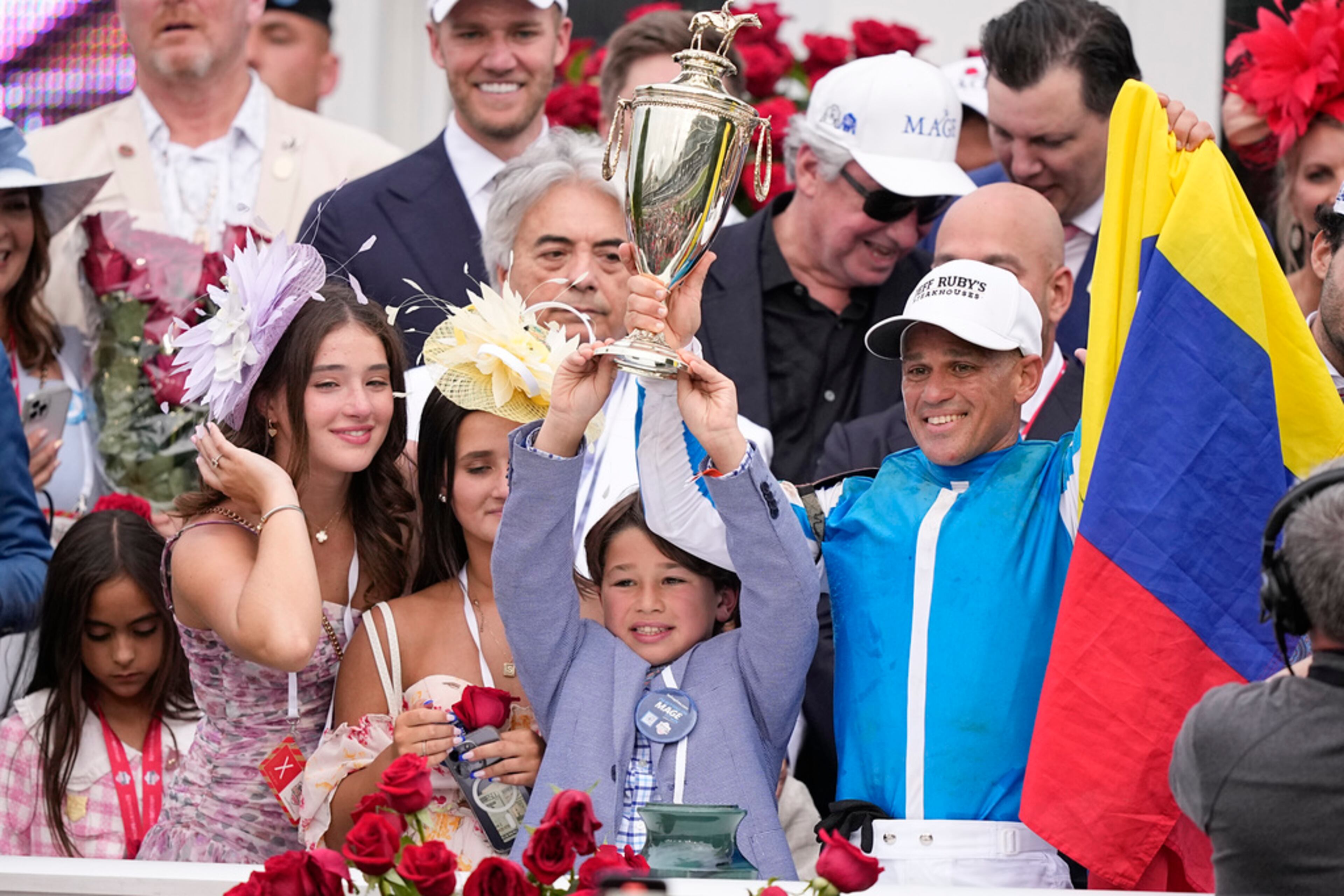 Javier Castellano, right, celebrates after riding Mage to win the 149th running of the Kentucky Derby horse race at Churchill Downs Saturday, May 6, 2023, in Louisville, Ky. (AP Photo/Brynn Anderson)