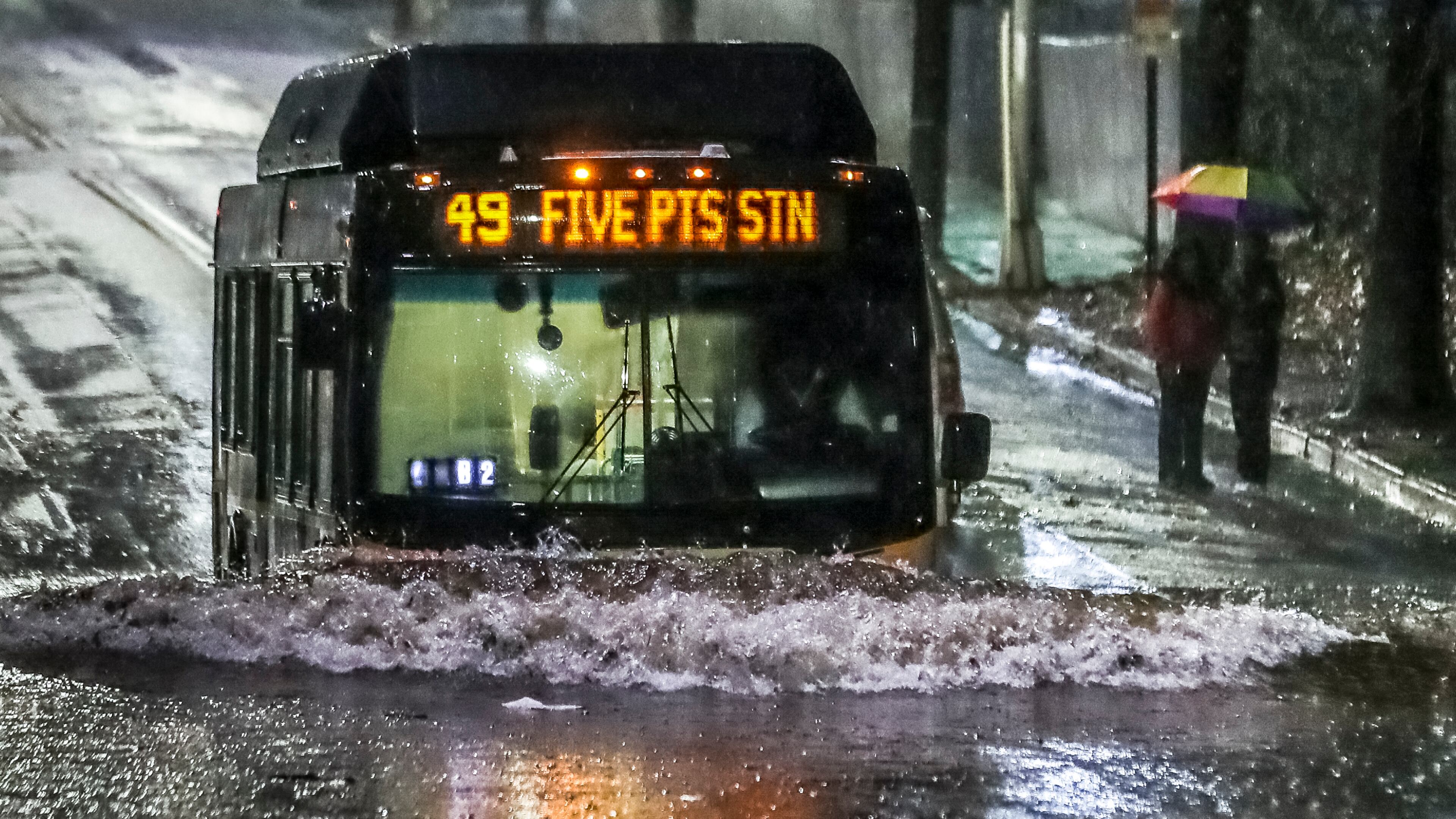January 4, 2023 ATLANTA: Near Turner Field, a MARTA bus trudged through standing water along Pollard Boulevard on Wednesday morning, January 4, 2023. Several routes were canceled or delayed due to flooding. The rain that moved in Tuesday evening brought with it flash flooding, severe thunderstorms and tornado watches across the state on Wednesday. Rolling severe thunderstorm warnings cropped up sporadically throughout metro Atlanta before daybreak as the system moved eastward, causing damaging wind gusts up to 73 mph and toppling trees as it rolled through. Several roads and portions of interstates had standing water as of 8:30 a.m. Just on I-285, at least five areas had flooding that caused all or partial lane closures, according to the Georgia Department of Transportation. All westbound lanes at Ga. 400 were closed, as were the westbound lanes to the I-85 exit. Thursday’s forecast will be mostly sunny with a high of 62 degrees according to Channel 2 Action News meteorologist Brian Monahan. (John Spink / John.Spink@ajc.com)