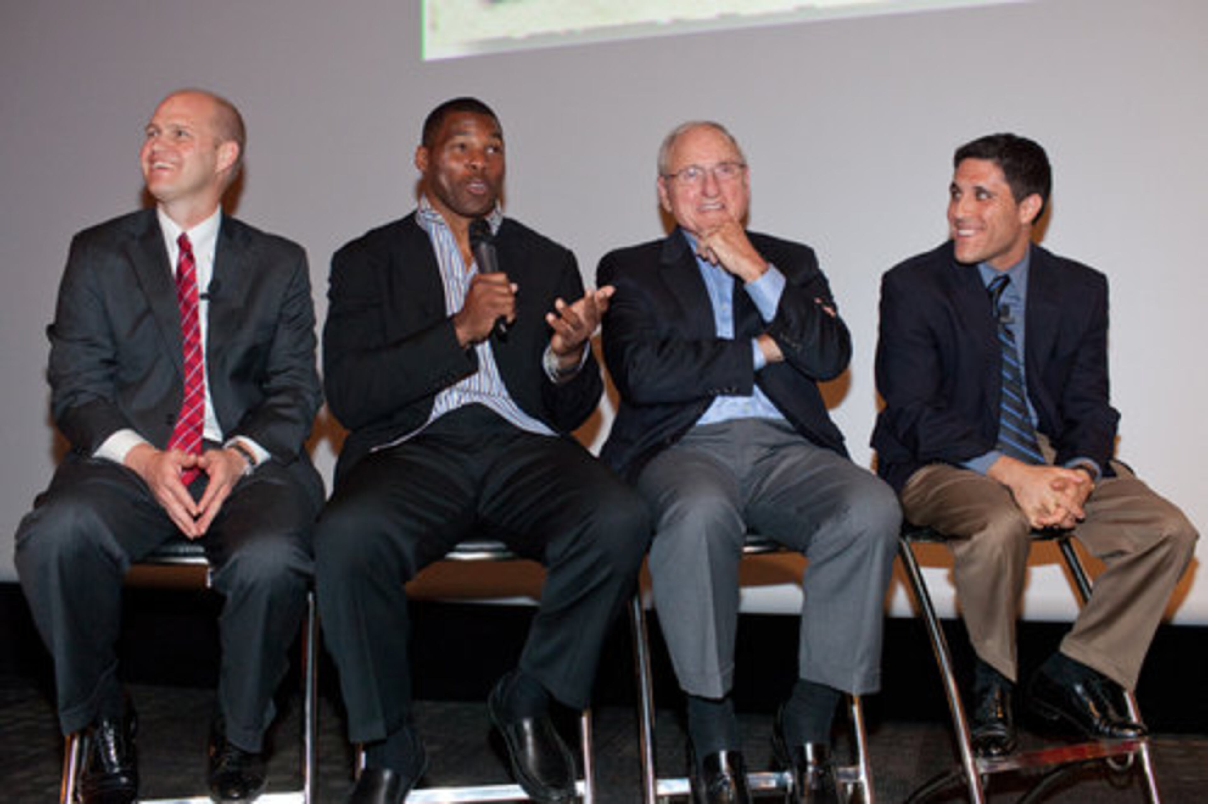 The film includes interviews with Herschel Walker's family, former Georgia coaches Vince Dooley and Mike Cavan, and teammates Frank Ros and Joe Happe, as well as his high school coach, his psychotherapist, former Dallas Morning News writer Skip Bayless and former USFL New Jersey Generals owner Donald Trump. A few were at hand for the premiere and Q&A Thursday at the World of Coca-Cola.