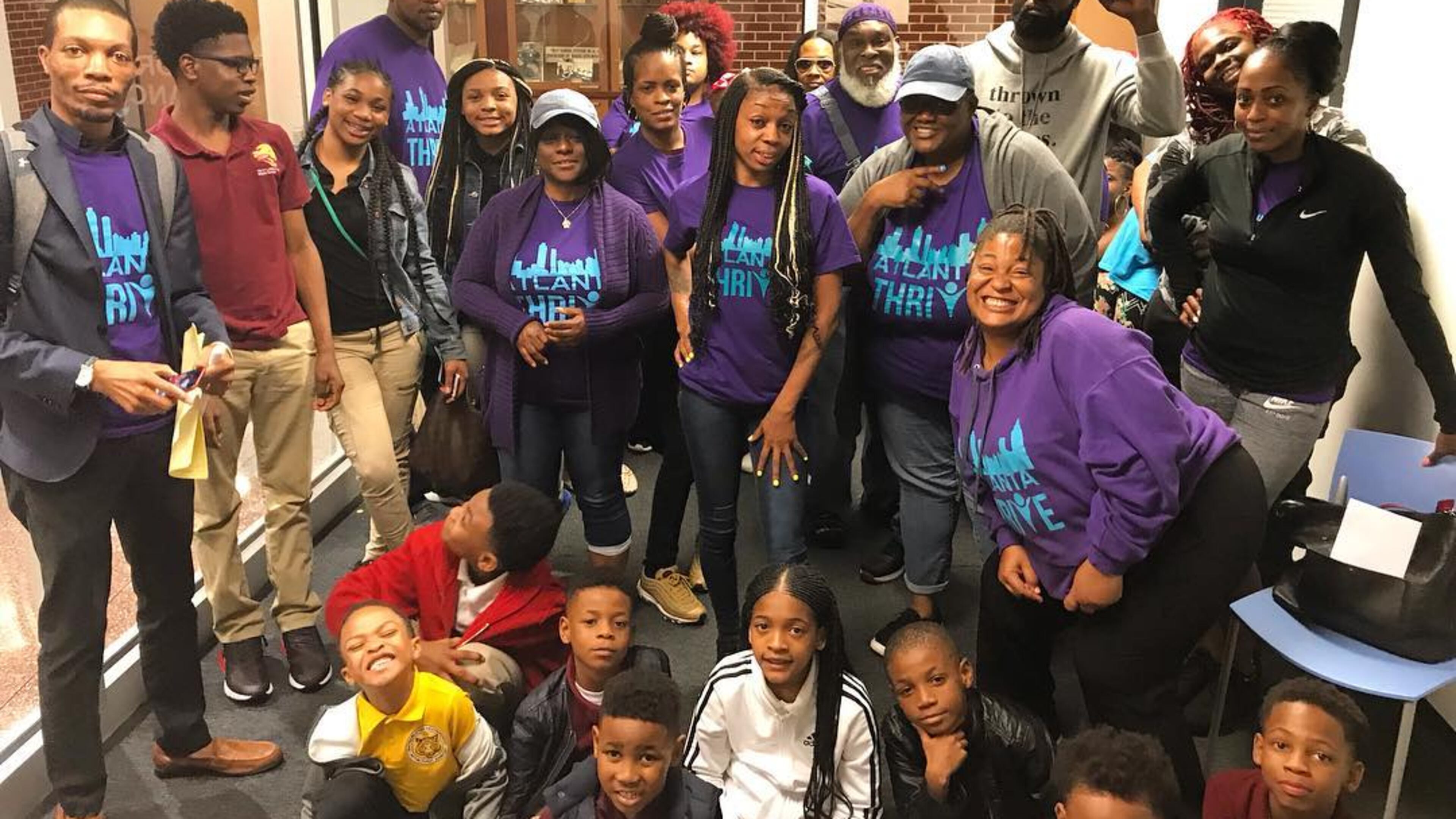 These are some of the parents involved in the Atlanta Thrive parents group. Kimberly Dukes, standing in the center with long braids, is the leader and co-founder. She writes today about the pressing need for radical change in APS.