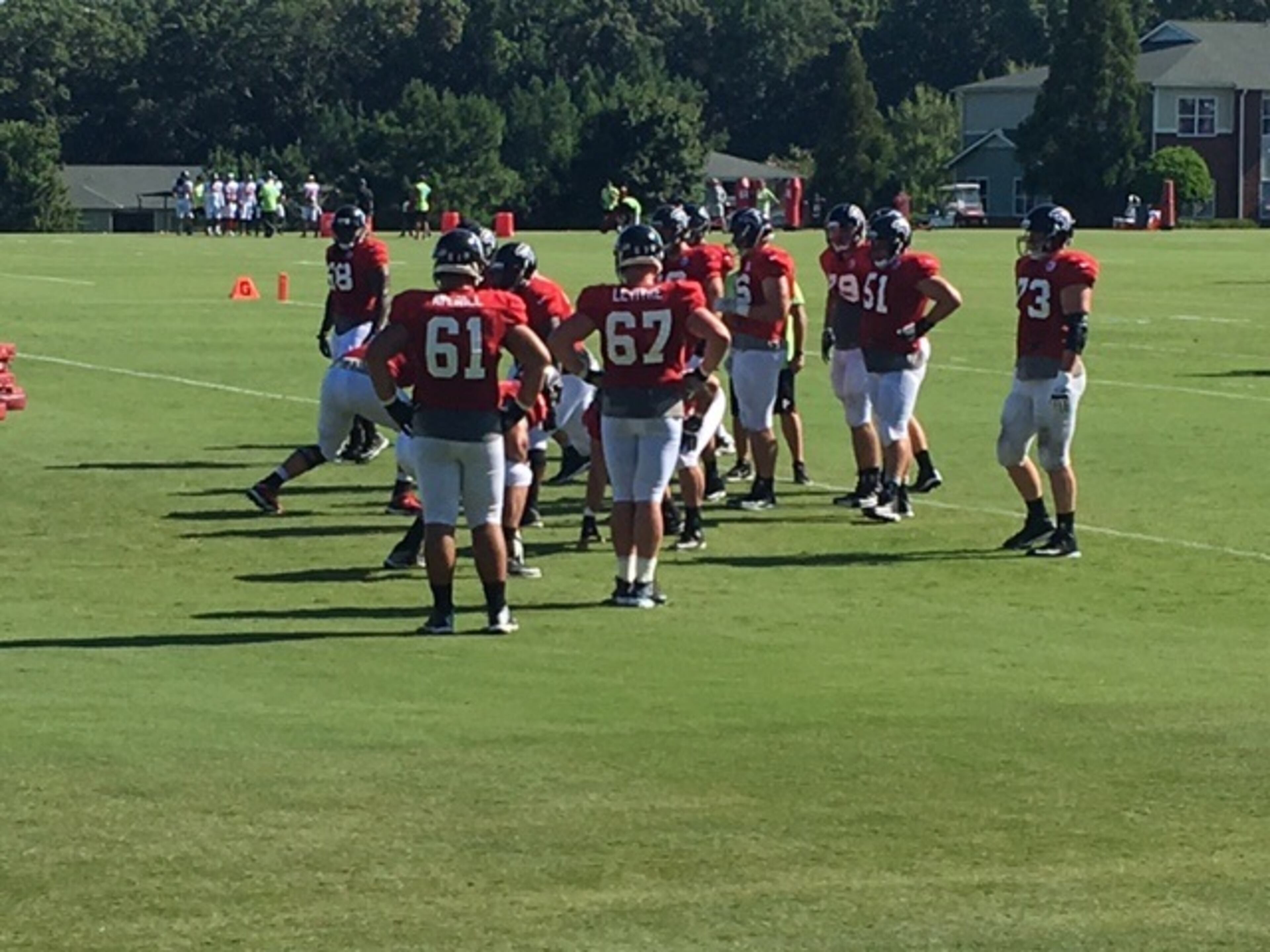 The Falcons held their first padded practice of training camp on Saturday. (By D. Orlando Ledbetter/dledbetter@ajc.com)