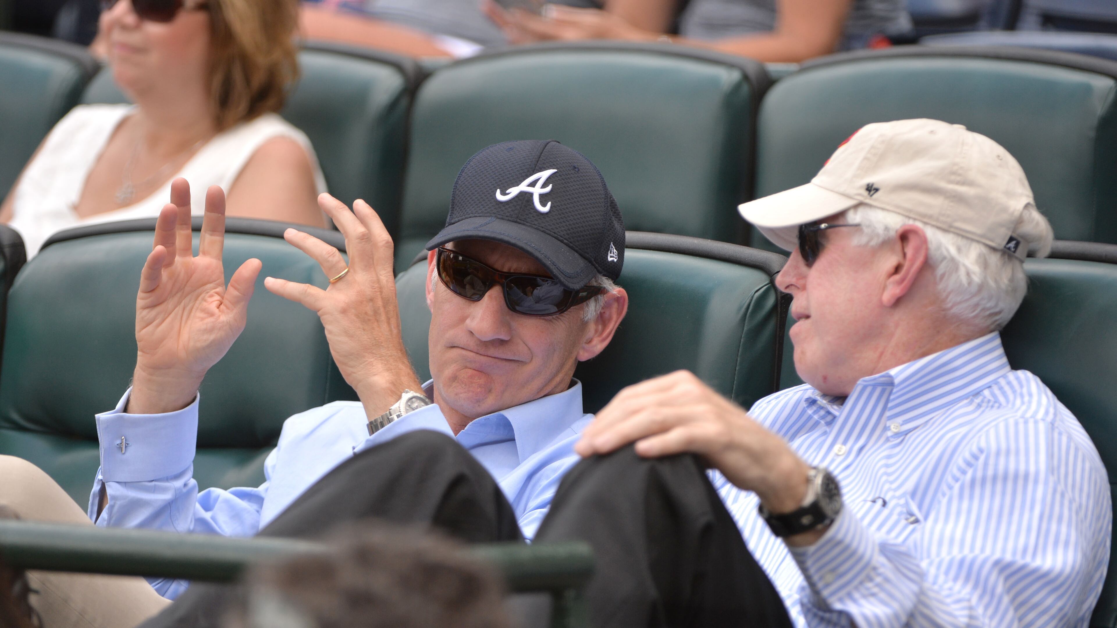 Liberty Media CEO Greg Maffei (left) and Braves chairman and CEO Terry McGuirk talk during a Braves game in 2016.