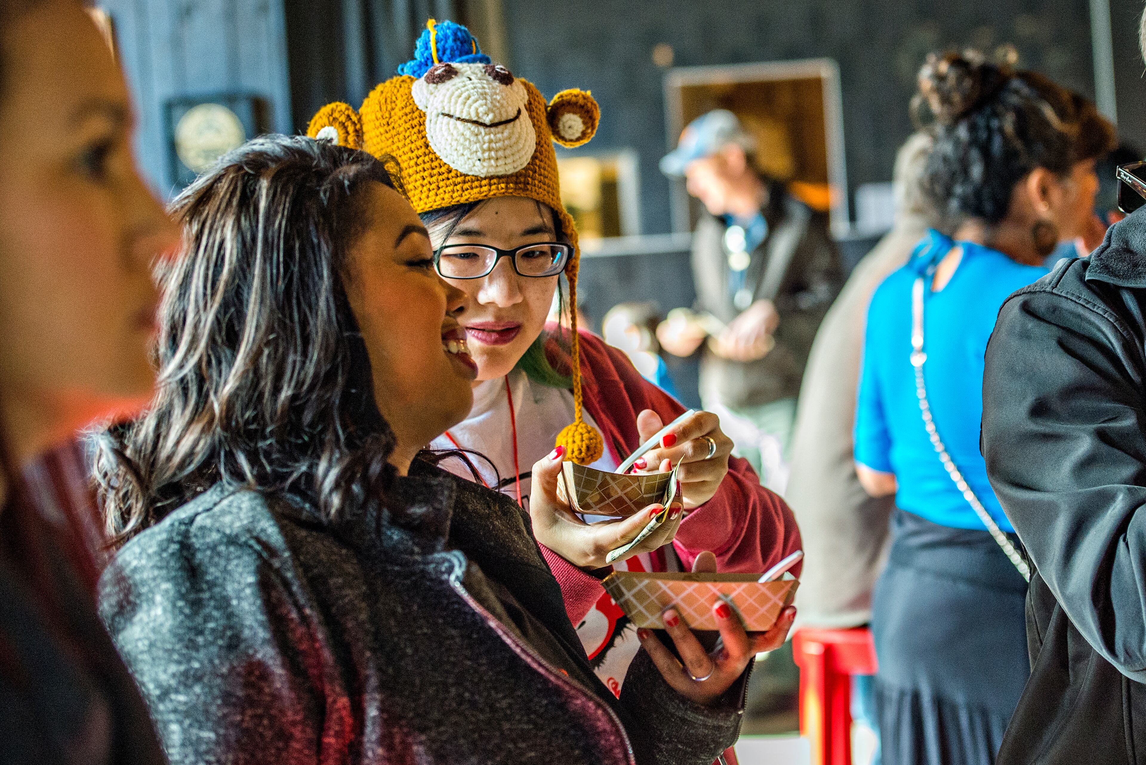 Nancy Chen (center) talks to Erin Barbee as they eat during the Lunar New Year Celebration at Makan in Decatur on Saturday, Feb. 6, 2016. JONATHAN PHILLIPS / SPECIAL