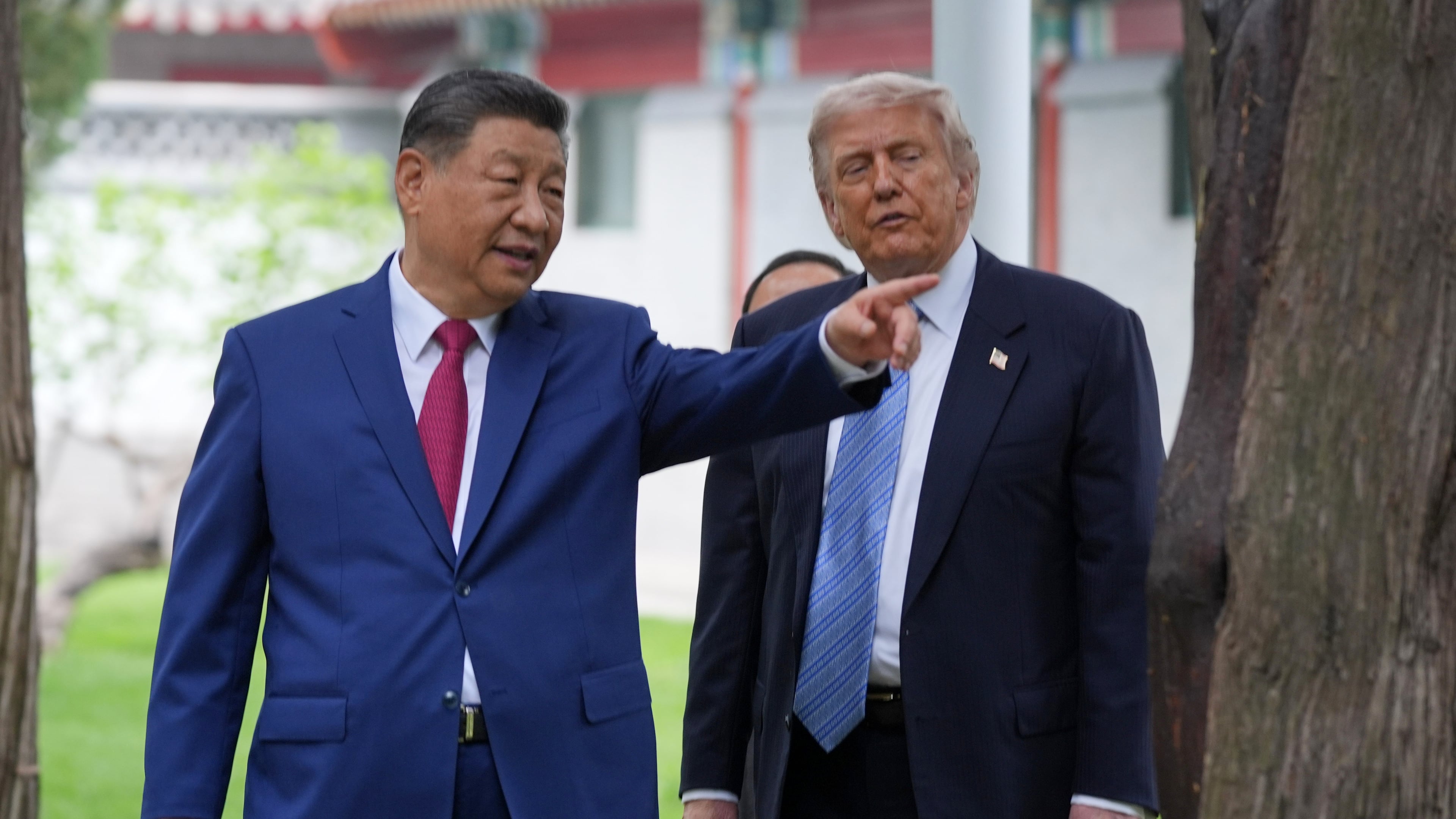 FILE - President Donald Trump talks with China's President Xi Jinping at the Zhongnanhai leadership compound, May 15, 2026, in Beijing. (AP Photo/Mark Schiefelbein, Pool, File)