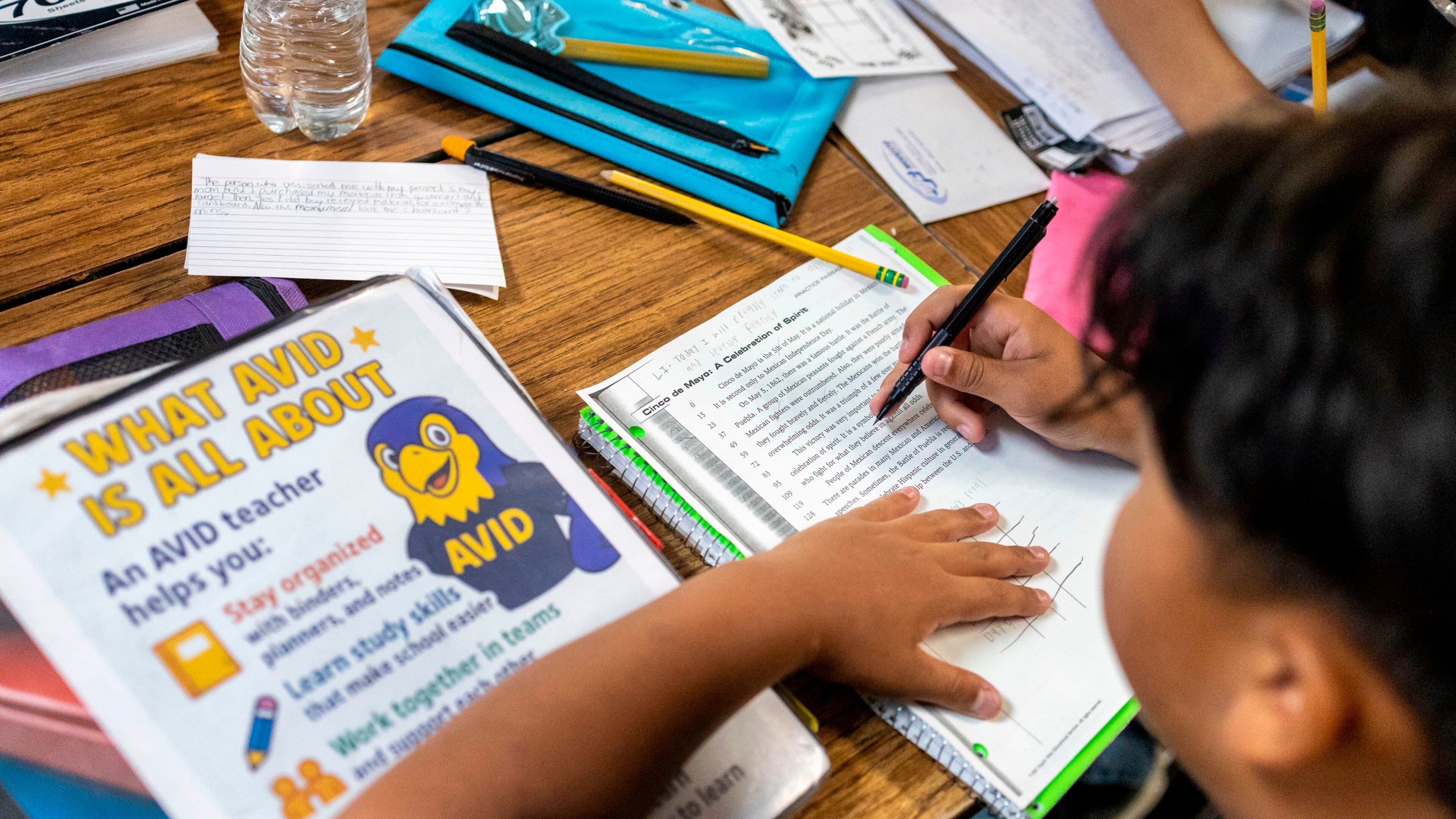 FILE - Sixth graders read a passage and give constructive feedback to their partners during a class at Fairview Elementary School, May 6, 2026, in Modesto, Calif. (AP Photo/Annie Barker, File)